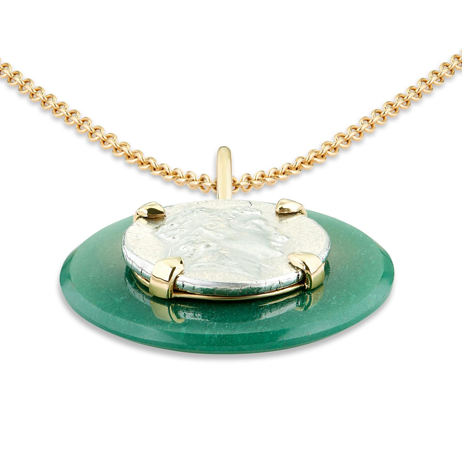 This DUBINI coin necklace from the 'Empires' collection features an authentic Ariarthes VII Philometor minted circa 116-101 B.C. silver coin set in 18kt gold with aventurine disc.

Disc diameter:  3cm
Chain Length:  75cm - also available in shorter