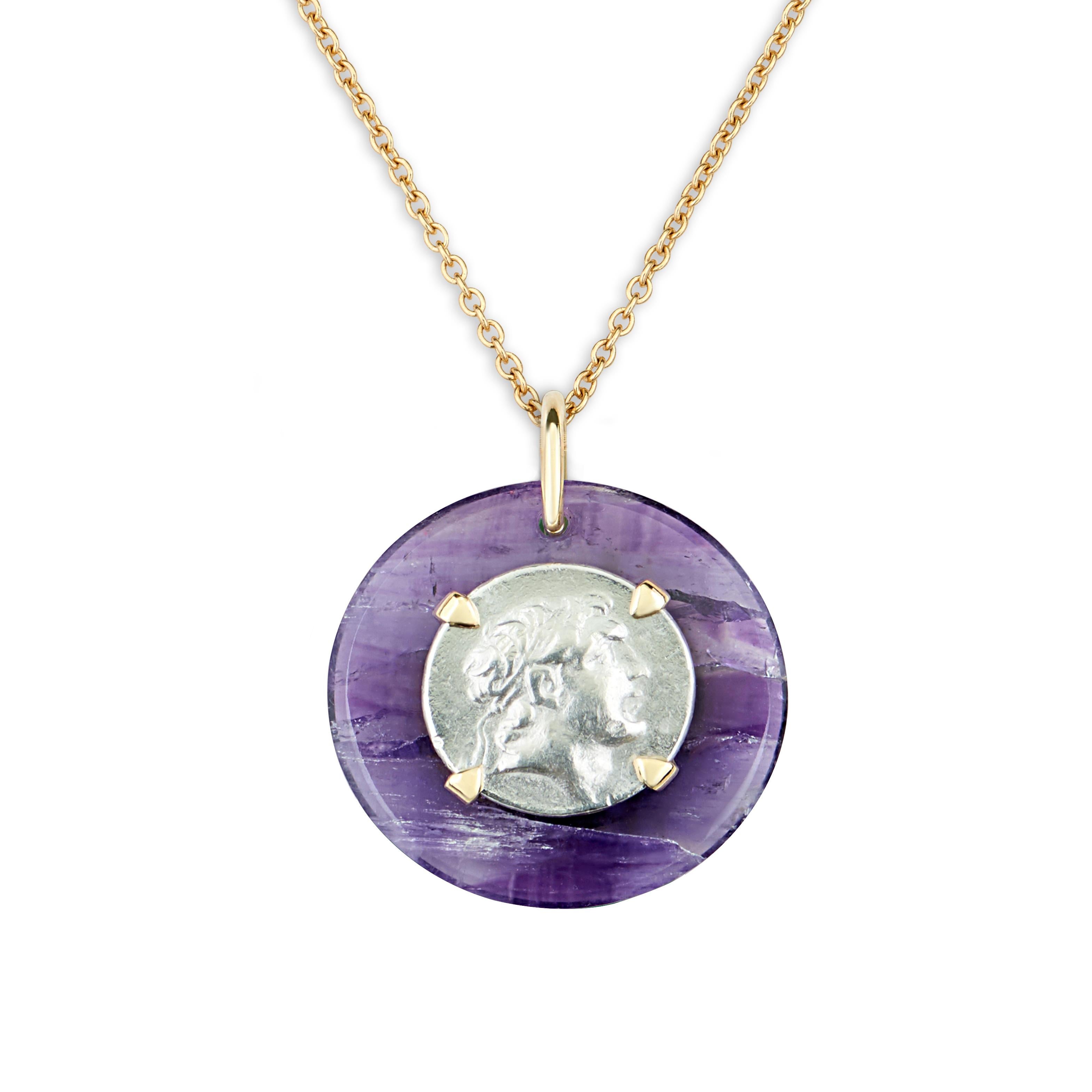 This DUBINI coin necklace from the 'Empires' collection features an authentic Ariarthes IX Eusebes Philopator (101-87 B.C.) silver coin set in 18K gold with amethyst disc.

Disc Ø 3cm

The medallion is also available with a long chain (75cm), medium
