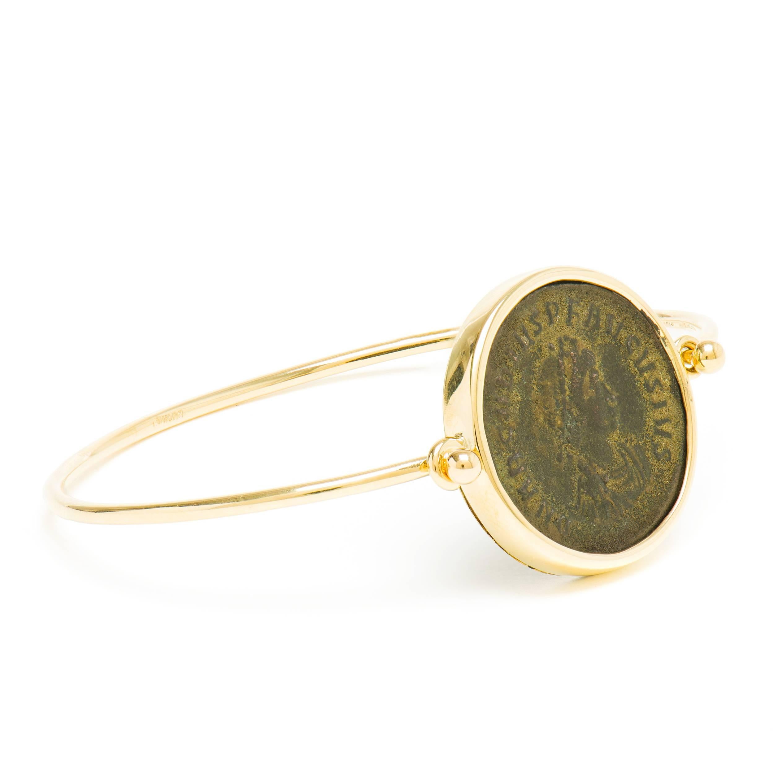 This DUBINI coin bracelet from the 'Empires' collection features an authentic Roman Imperial bronze coin set in 18K yellow gold.

* Due to the unique process of hand carving coins in ancient times, there may be a few stylistic differences from the