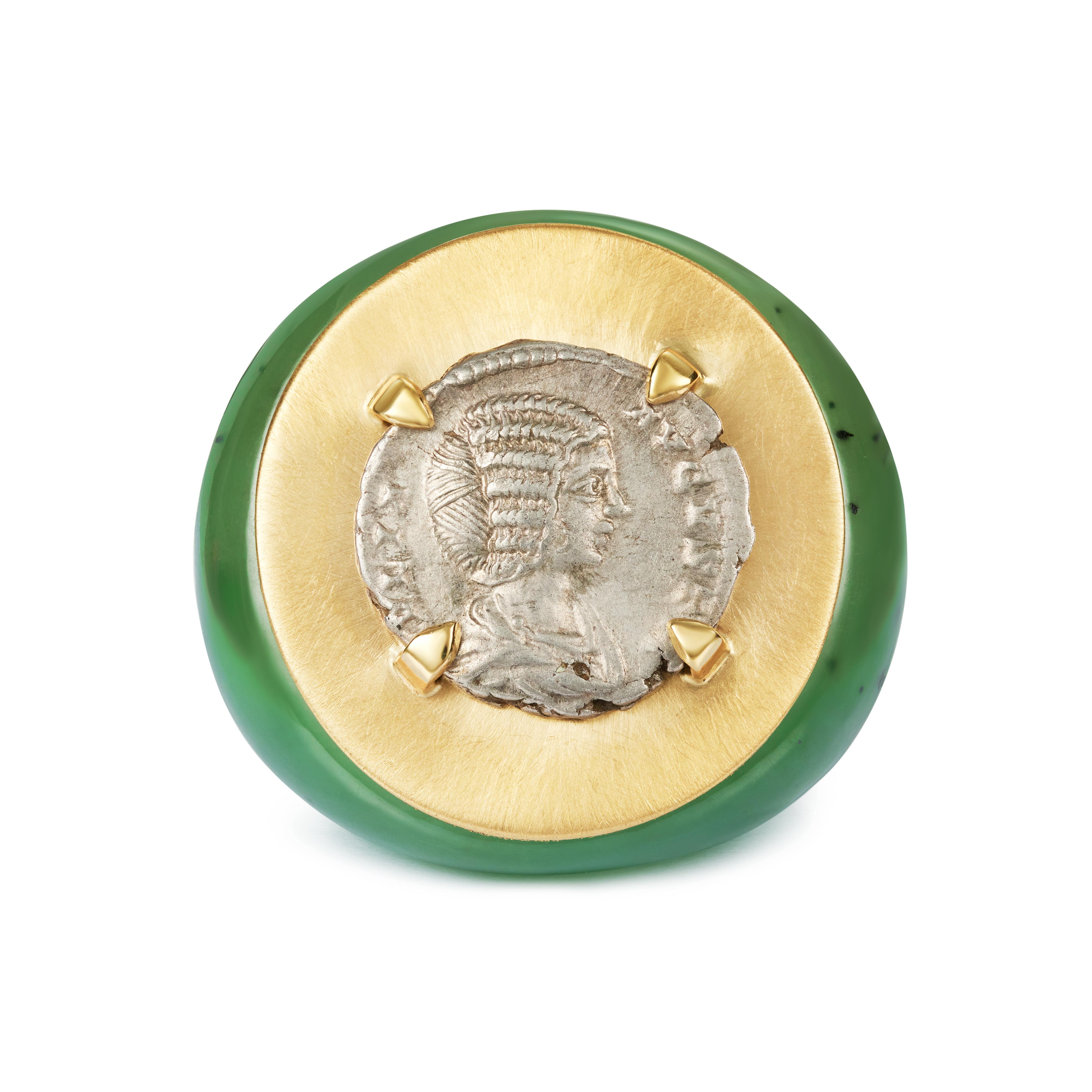 This DUBINI coin ring from the 'Empires' collection features a one-of-a-kind authentic roman silver denarius coin minted circa 200 A.D. set in 18kt brushed yellow gold and apple jade base ring.

Depicted on the Coin

Obverse: Julia Domna AR