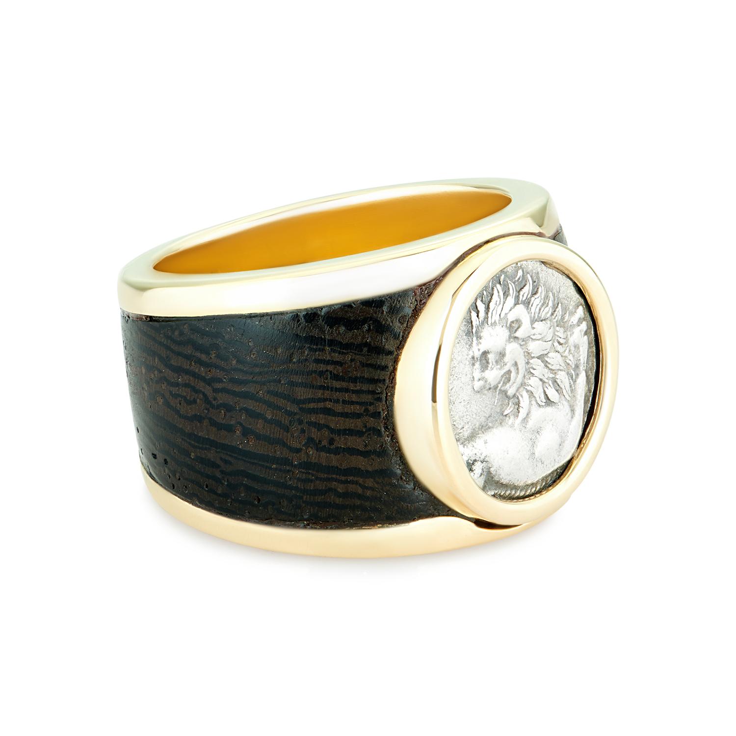 This unique DUBINI coin ring from the 'Empires' collection features an authentic Thracian silver coin minted circa 4th century B.C. set in 18kt yellow gold with wooden inlay.

Ring size available: 52

Additional sizes may be ordered with a lead time