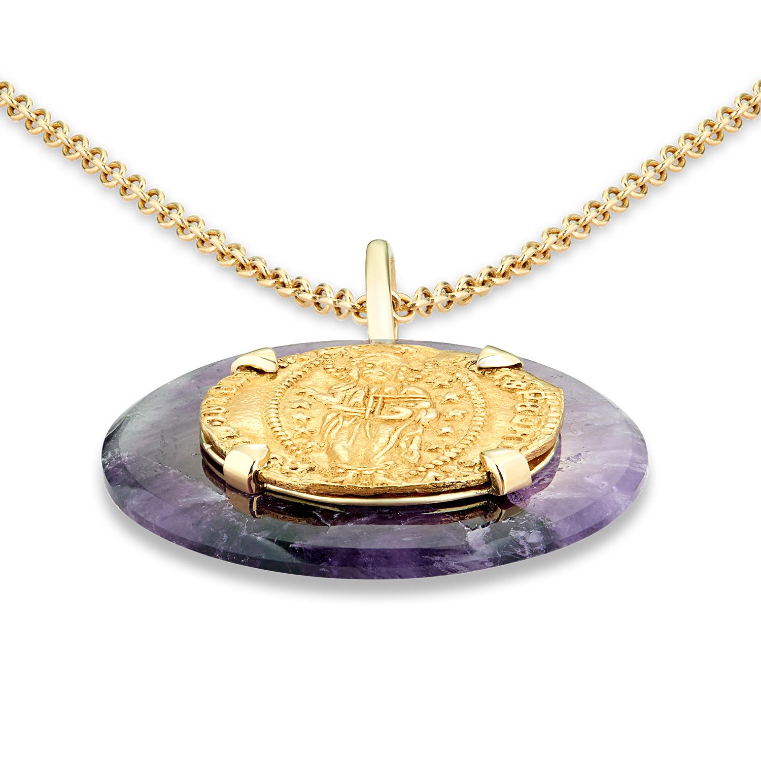 This DUBINI coin necklace from the 'Empires' collection features an authentic Venetian gold ducat coin (LXII Doge 1382-1400) set in 18K yellow gold with amethyst quartz disc.

Disc diameter  3cm
Chain Length  75cm - also available in shorter 47cm on