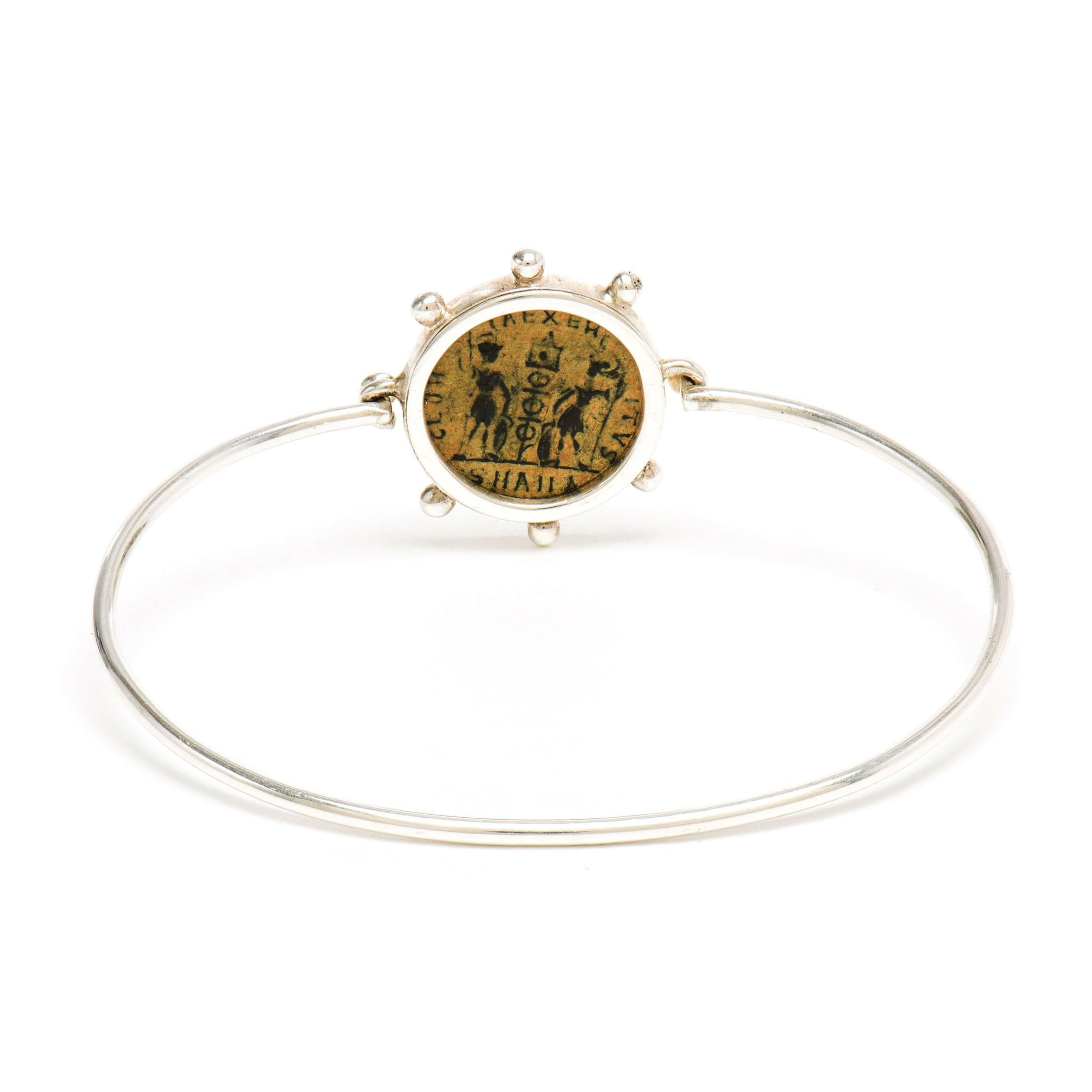This DUBINI coin bracelet from the 'Empires' collection features an authentic Roman bronze coin set in sterling silver.

* Due to the unique process of hand carving coins in ancient times, there may be a few stylistic differences from the image