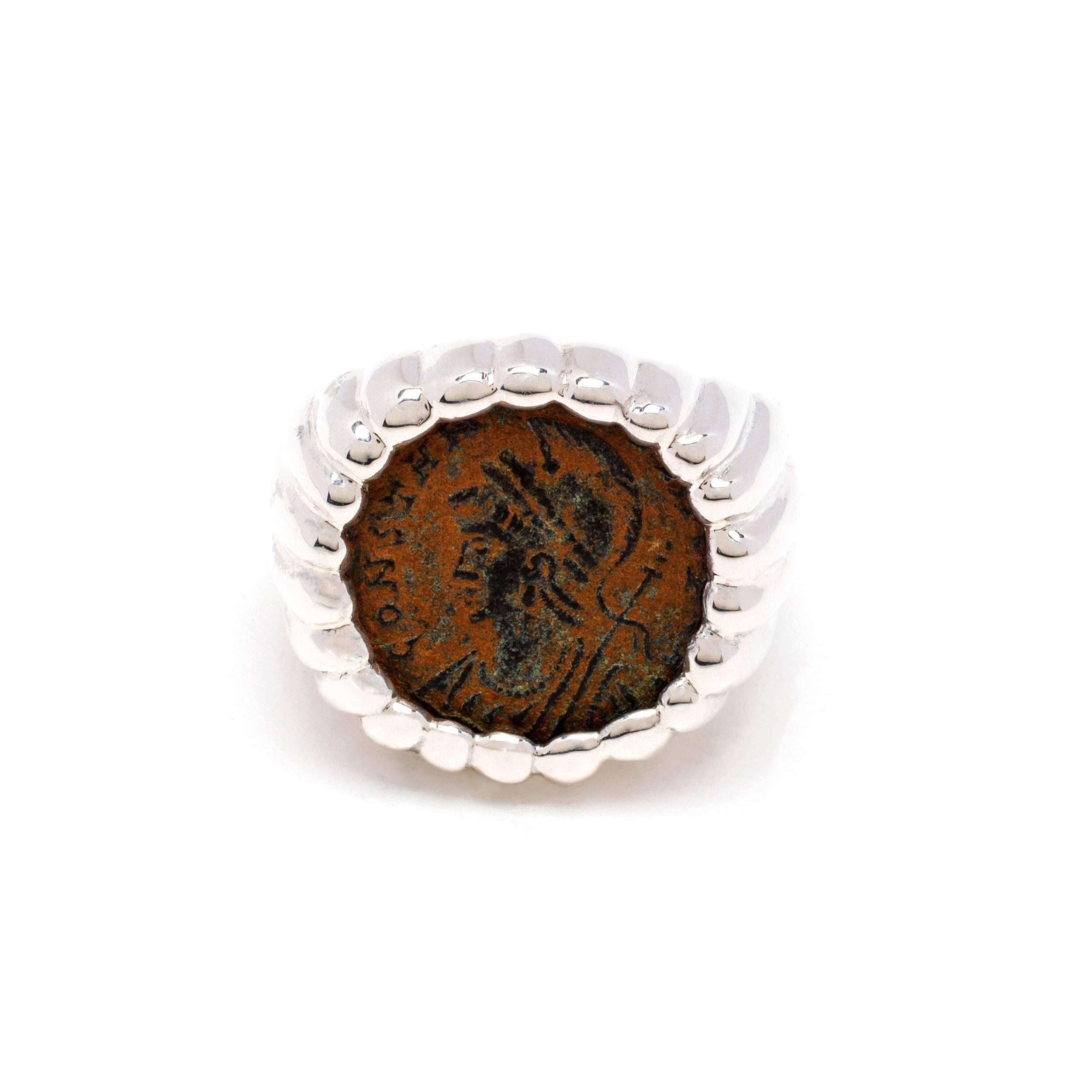 This DUBINI coin ring from the 'Empires' collection features an authentic Roman Imperial bronze coin set in sterling silver.

The ring may be ordered in any size with a lead time of 3-4 weeks.

* Due to the unique process of hand carving coins in