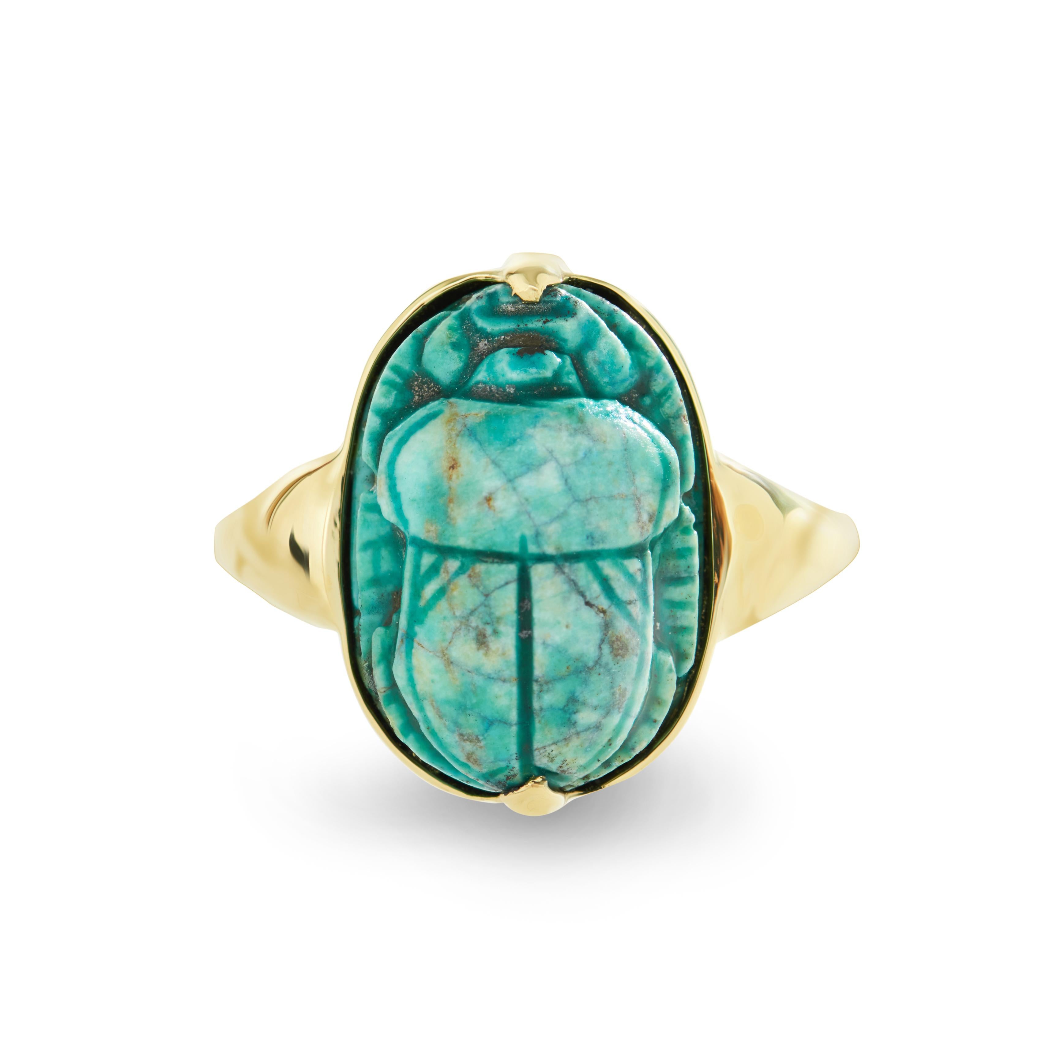 This DUBINI ring features an egyptian faience scarab set in 18K yellow gold.

See our selections of scarabs to create your unique ring.

Dimensions of Scarabs:
13x19x10mm

HISTORY
Along with the pyramids, sphinxes, and mummies, the scarabs are one