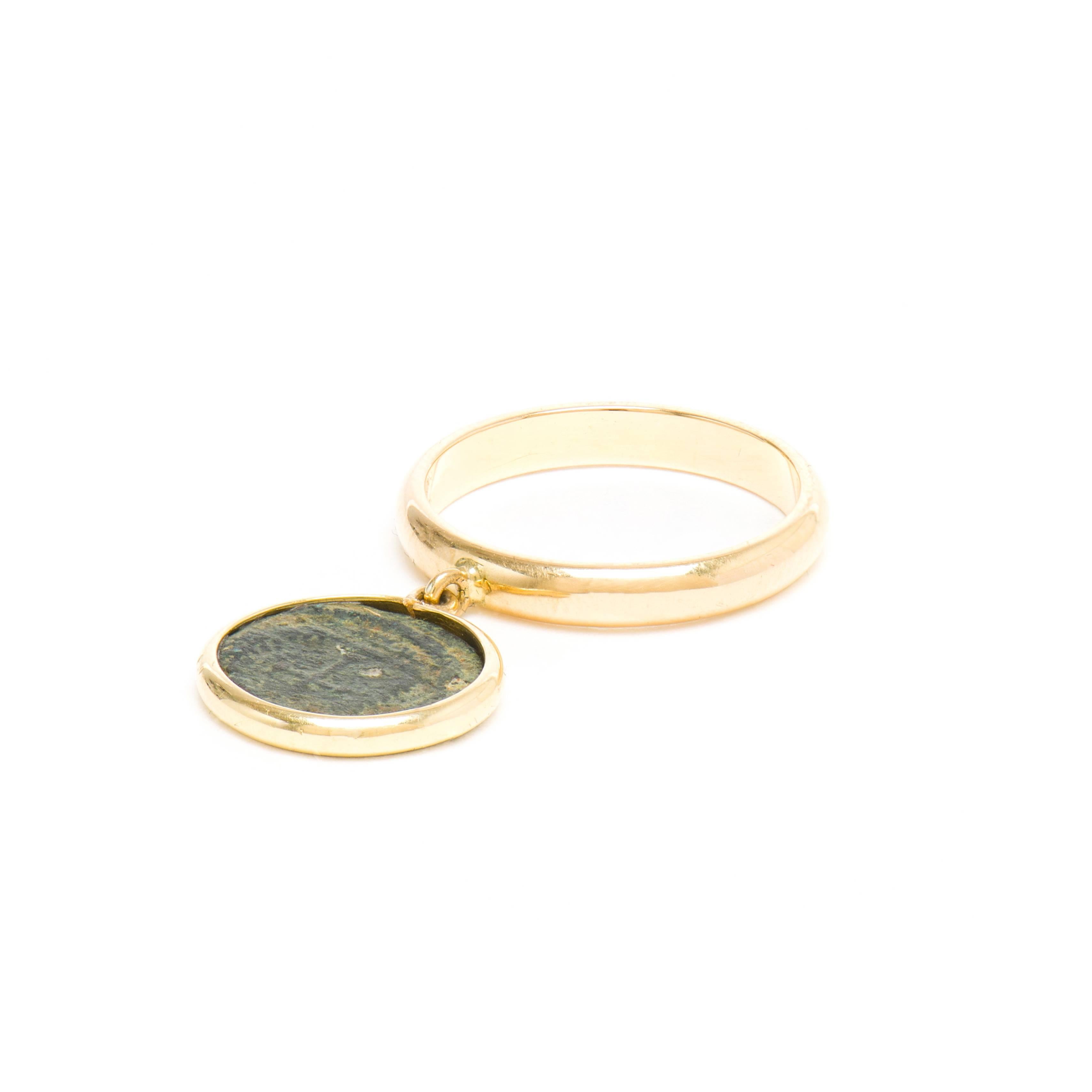 This DUBINI coin ring from the 'Empires' collection features an authentic Roman bronze coin set in 18K yellow gold.

Made to order with a lead time of 2-3 weeks.

* Due to the unique process of hand carving coins in ancient times, there may be a few