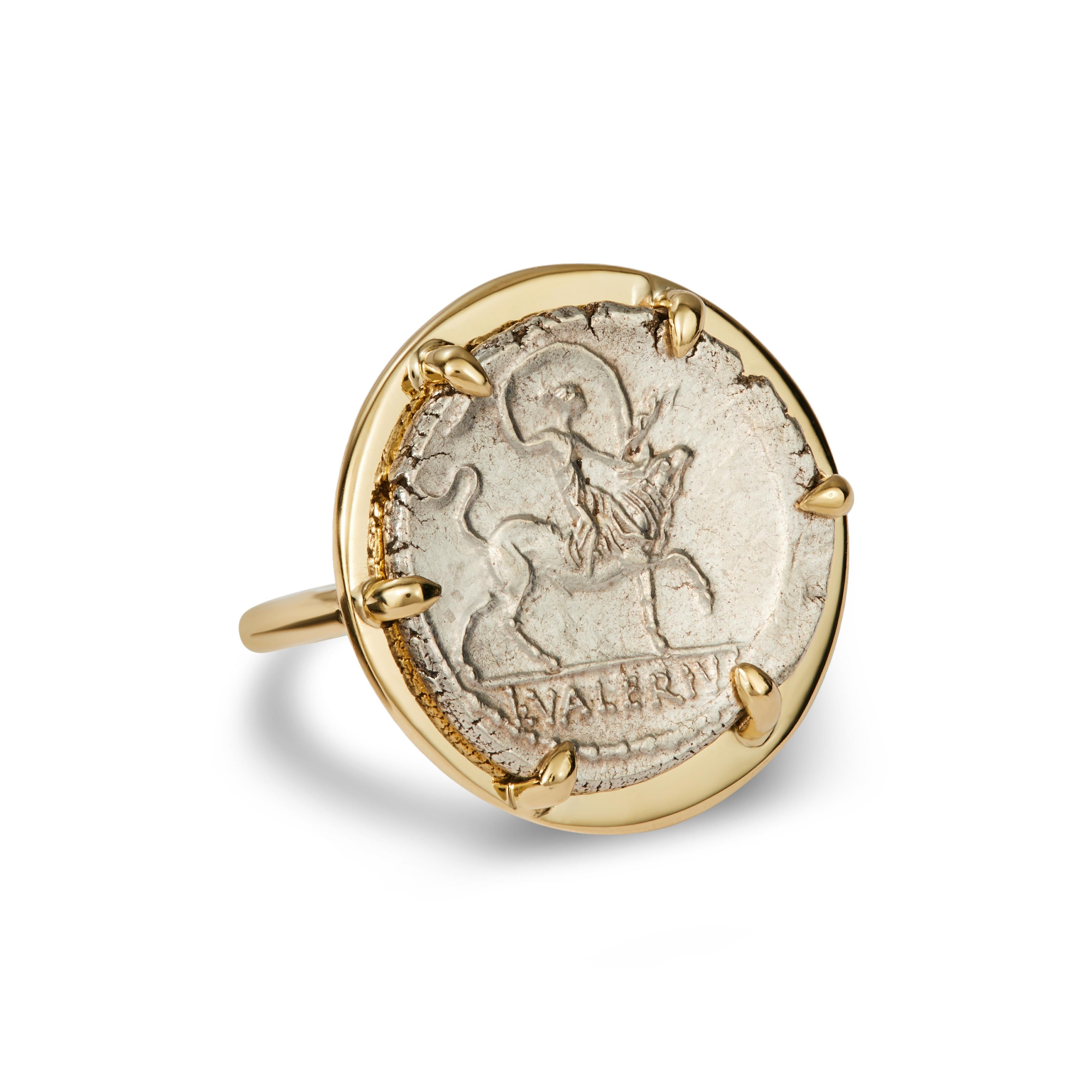 This DUBINI coin ring from the 'Empires' collection features an authentic silver coin dating 45 B.C. set in 18K yellow gold.

DEPICTED ON THE COIN

Obverse: Europa riding bull right, holding her veil which billows out above; L·VALERIV[S].

Reverse: