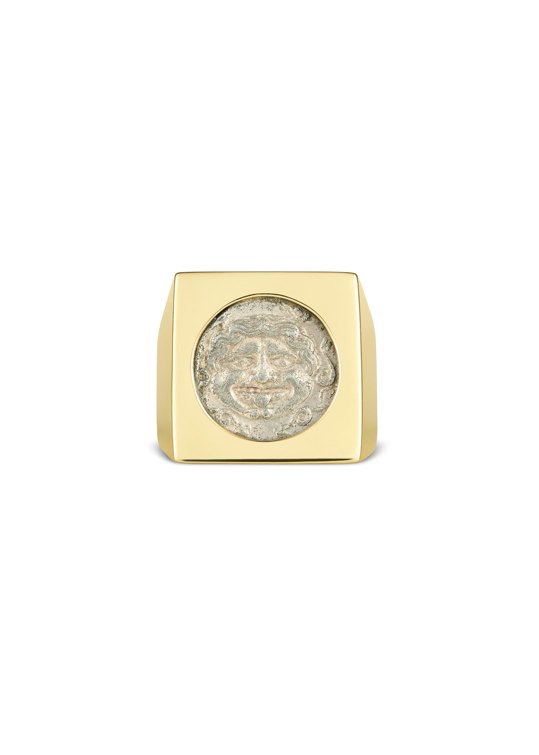 This DUBINI coin ring from the 'Empires' collection features an authentic silver hemidrachm coin from Mysia dating circa 4th century B.C. set in 18K yellow gold.

Coin Ø 13mm
Coin Weight 2.41g

DEPICTED ON COIN: 
Obverse - Facing gorgoneion within