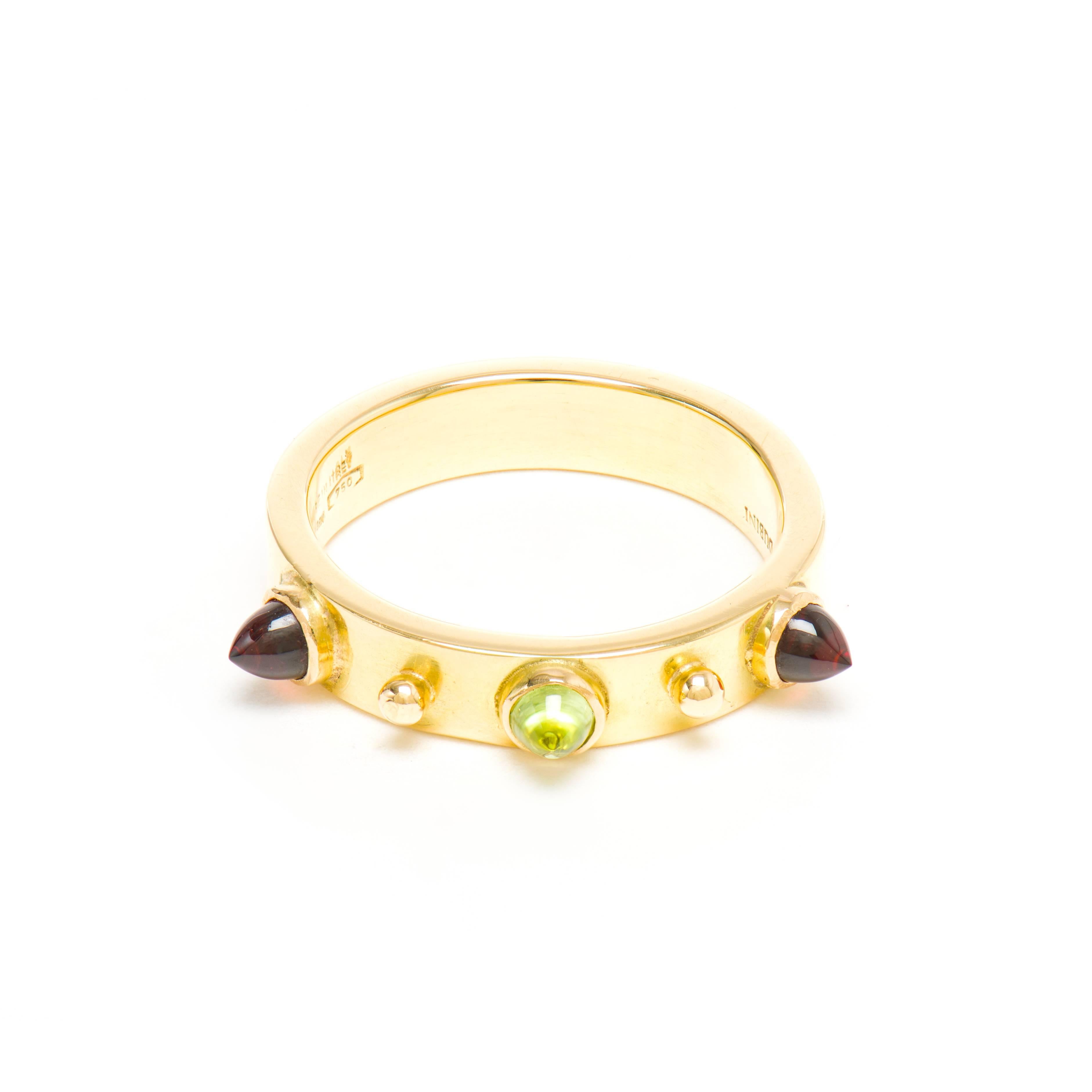 This DUBINI ring from the 'Empires' collection features our signature bullet cabochons set in 18K yellow gold.

Available in size EU 52.

This ring can be ordered in any size with a lead time of 1-2