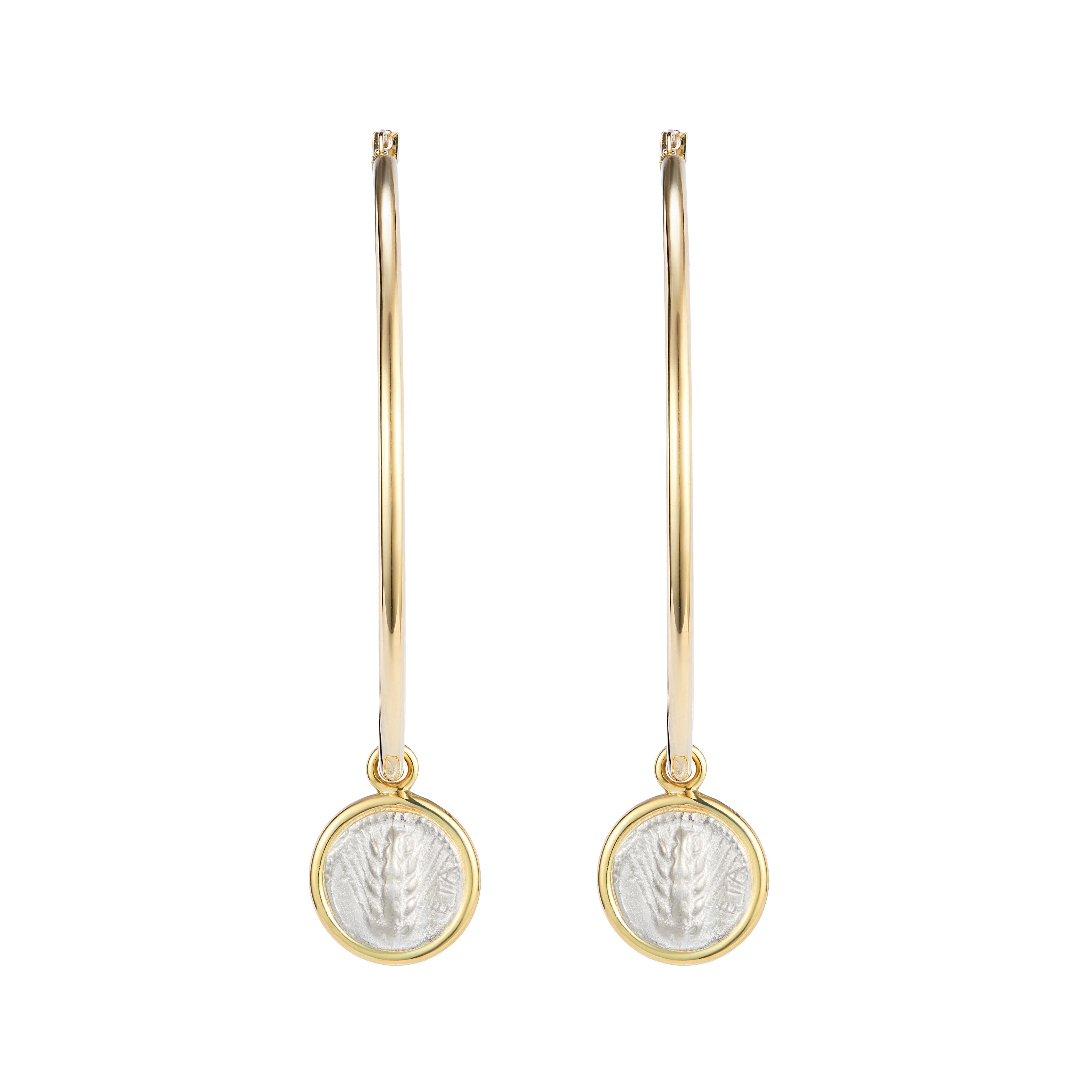These Dubini coin hoop earrings from the 'Empires' collection feature sterling silver replicas of Thracian silver coin minted circa 4th century B.C. set in 18kt yellow gold.

Chersonesos was founded in the 8th Century B.C. by settlers from Thrace.