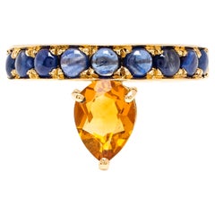 Anillo Dubini Theodora de oro amarillo de 18 quilates con citrino y zafiro azul