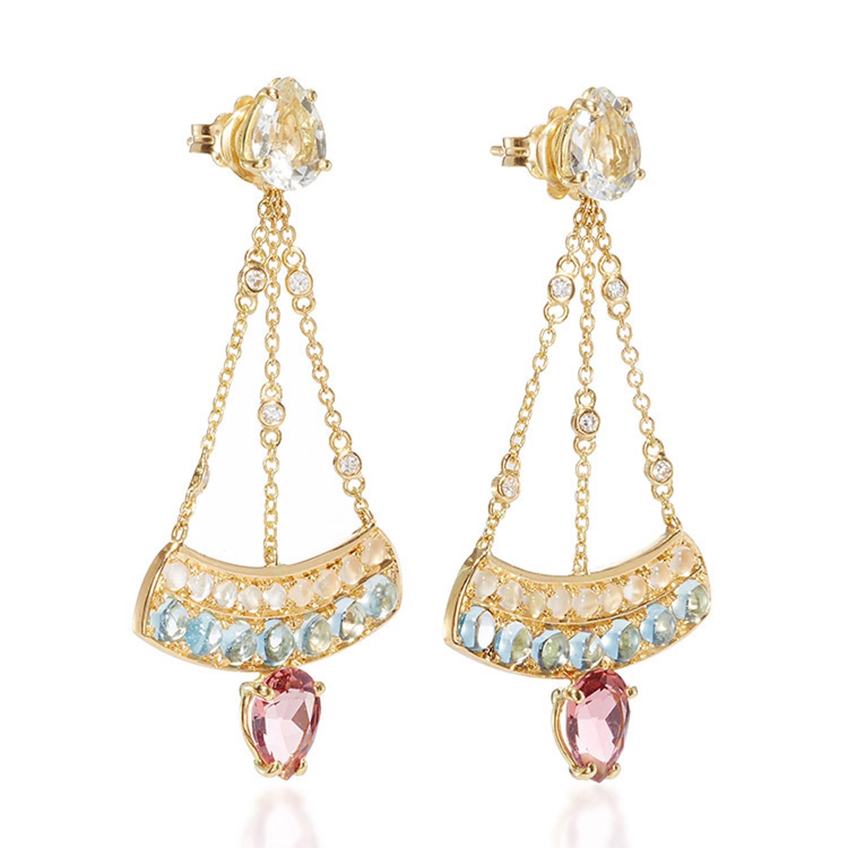These DUBINI earrings from the 'Theodora' collection feature white topaz and rubellite drops with aquamarine, moonstone cabochons with diamonds set in 18K yellow gold.

…………………………………………………………………………………………………………………………………………………………………….

Inspired by