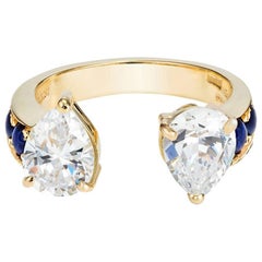 Dubini Theodora Bague en or jaune 18 carats avec topaze blanche et saphir