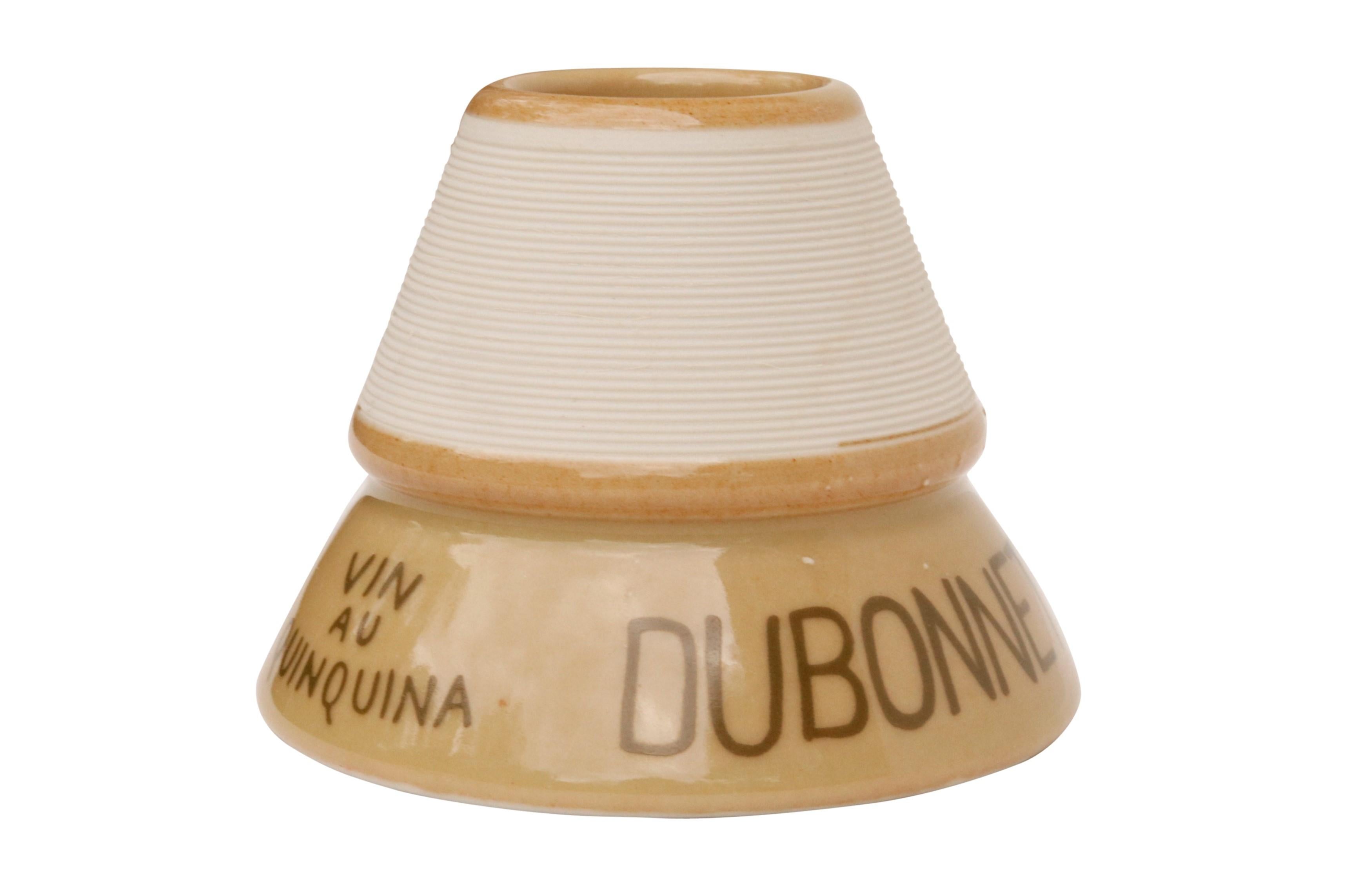 A Parisian café match striker and keeper. Made to advertise Dubonnet and the Grand Prix of 1900. In excellent condition.
 
