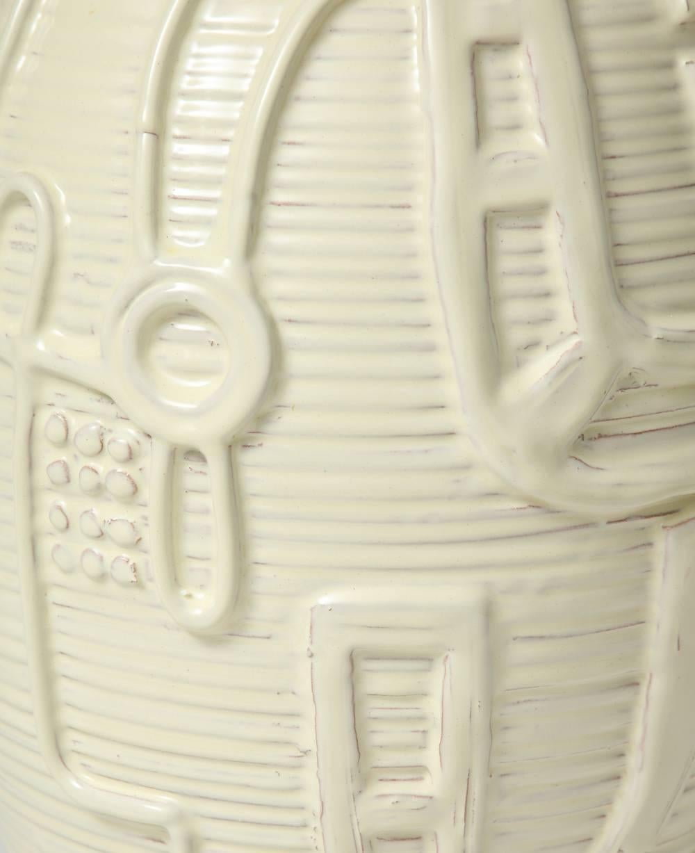 Large-scale ceramic bottle by Duca di Camastra.
Beautiful and large terra cotta bottle form with incised lines and hand-applied decoration. Creamy-white glaze, and signed on underside.