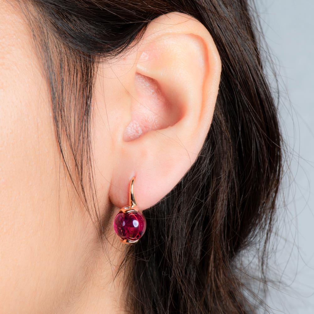 Embraced by 18-karat gold are 9.30 carats of strawberry pink tourmalines accented by 0.14 carats of white diamonds... These are the Duchess earrings, a Zorab Creation.
 
Raspberry pink tourmaline have long been a desired gemstone by royals. The