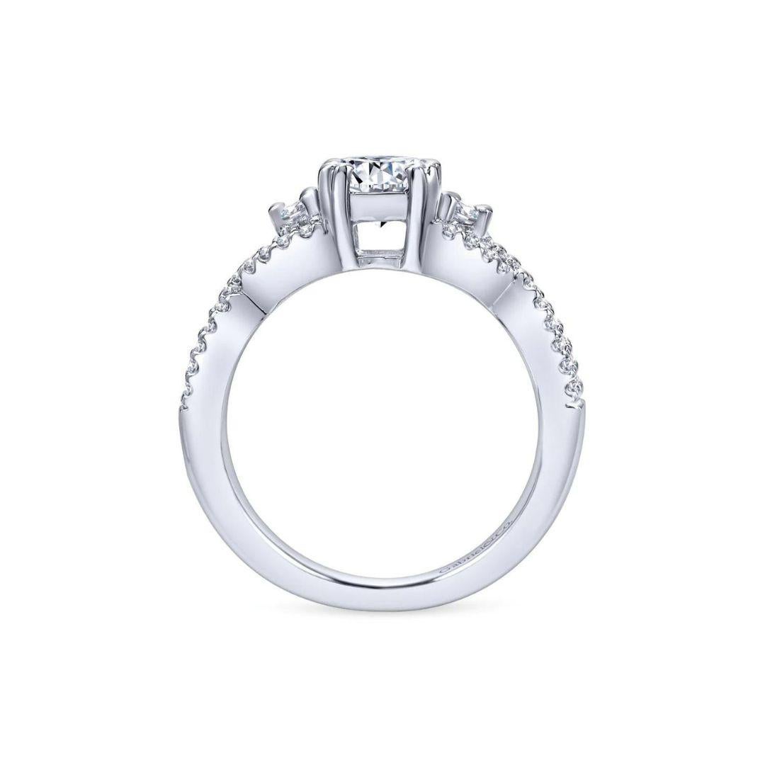Ladies' 14k White Gold Diamond  Engagement Mounting﻿. Diamond pave weaves into the ring's shank and extends to the sides of the center stone to give this one of a kind ring a romantic appeal. Center diamond NOT included. Side diamonds 0.30 ctw, H