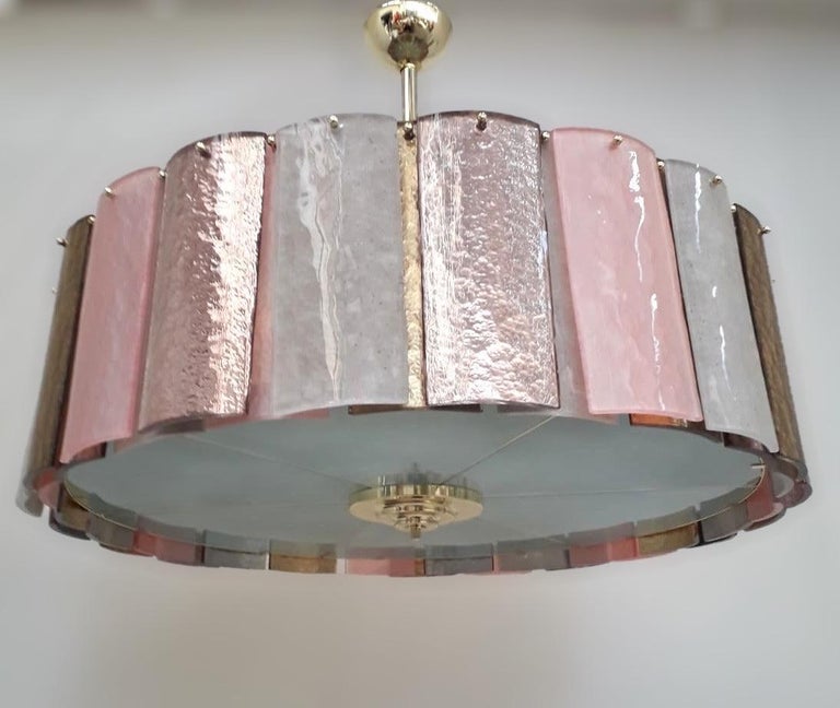 Italian modern chandelier shown in gold, frosted, pink and amethyst textured Murano glass tiles with frosted granulated glass diffuser mounted on brass structure, designed by Fabio Bergomi for Fabio Ltd / Made in Italy 
6 lights / E26 or E27 type /
