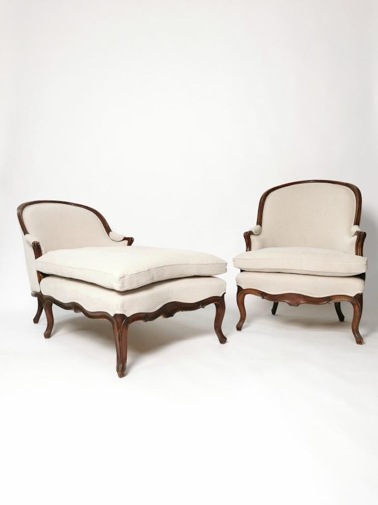 A Louis XV walnut Duchesse Brisée, mid-18th century.
In two sections compromising a Bergère and a chaise longue, both covered in heavy De La Cuona linen.
Carved walnut frame.
Exceptional large and comfortable model.
  