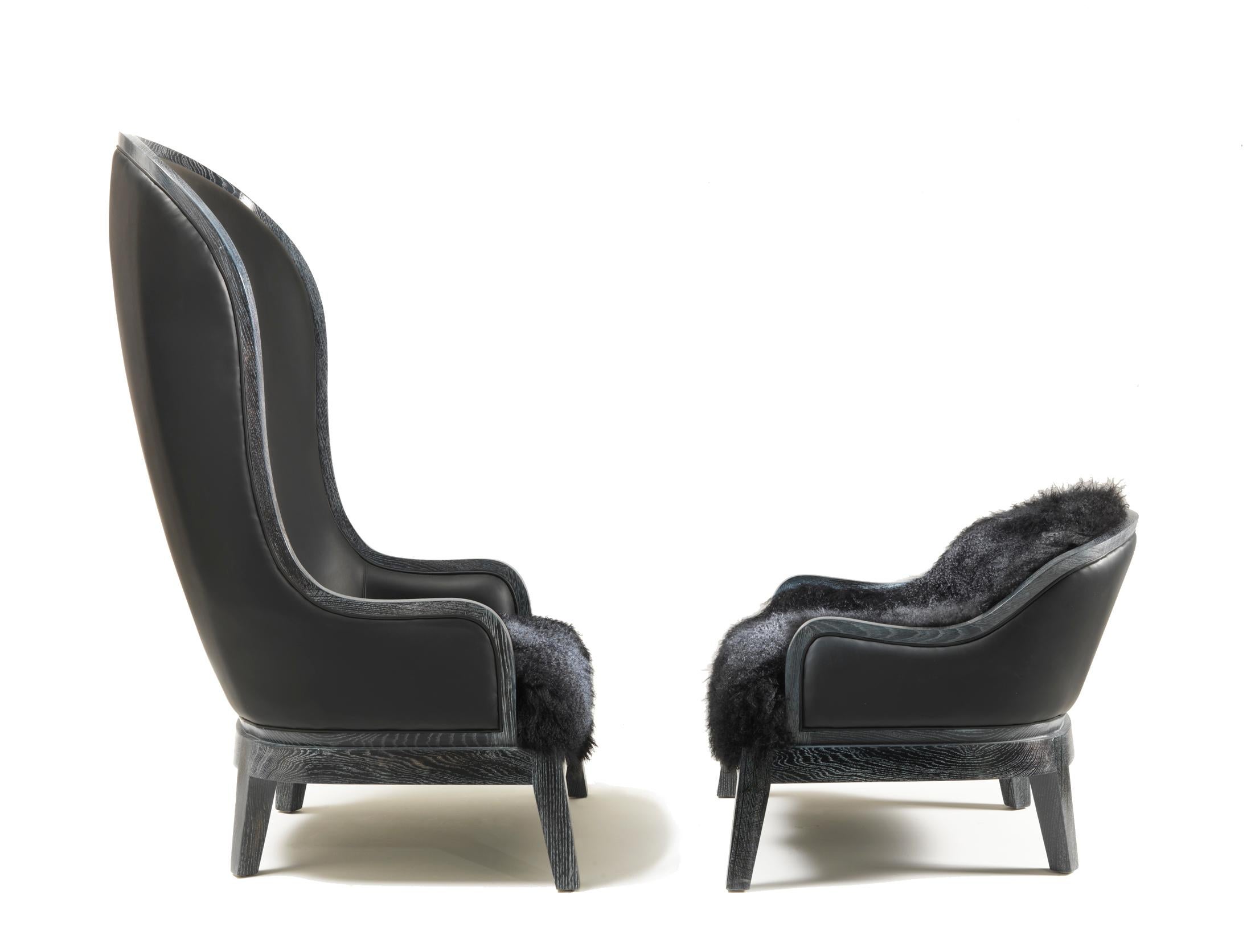 
Unveil the regal elegance of the Duchess of Home—an imposing seat designed by Archer Humphryes Architects that commands attention with its stately presence. This extraordinary piece is a harmonious blend of form and function, boasting a tall back