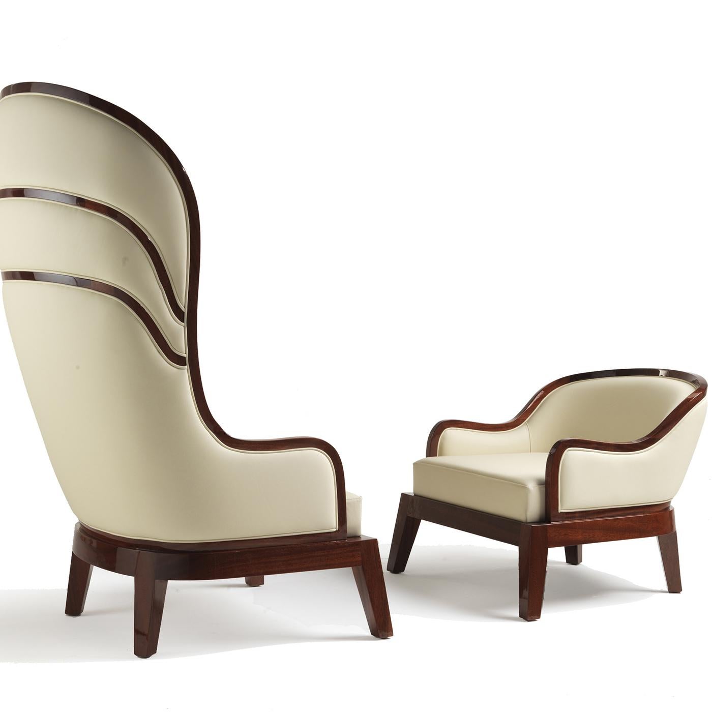 Cette magnifique chaise haute à oreilles est un superbe ajout à tout intérieur, qu'il soit classique ou moderne. L'interprétation contemporaine de ce meuble d'appoint crée un design stylisé à fort impact visuel pour un salon ou un bureau, où il peut