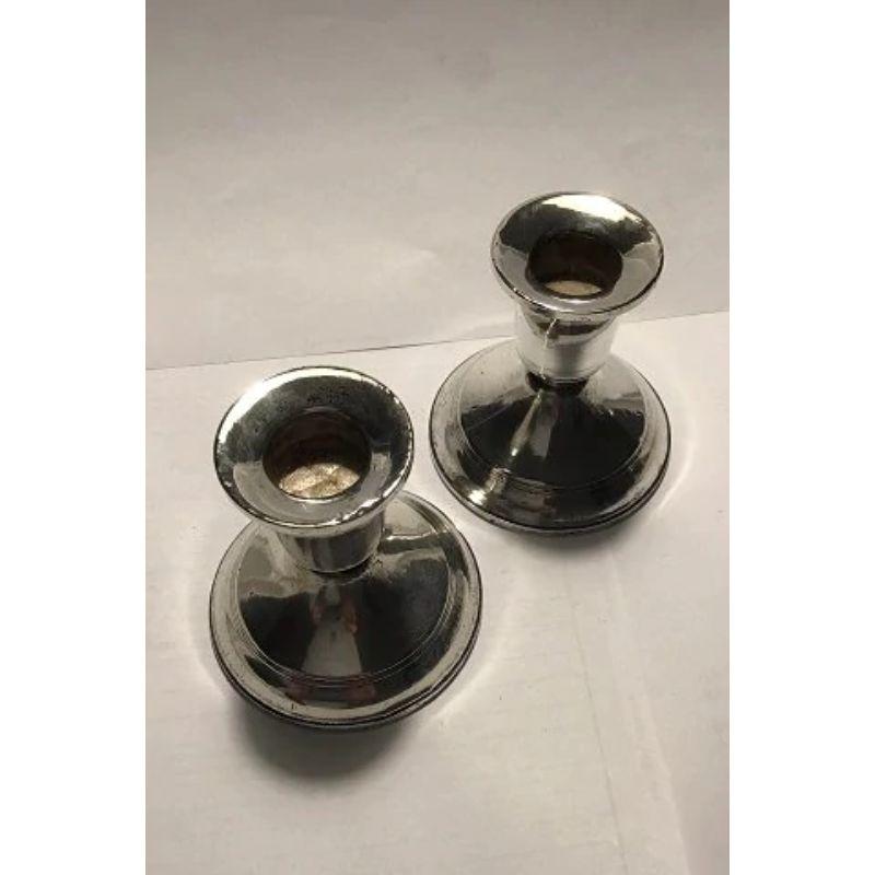 Duchin sterling silver candlesticks.

Measure: H 7.4 (2 29/32 in). Combined weight (filled) 287 gr/10.12 oz (Signs of usage).
 