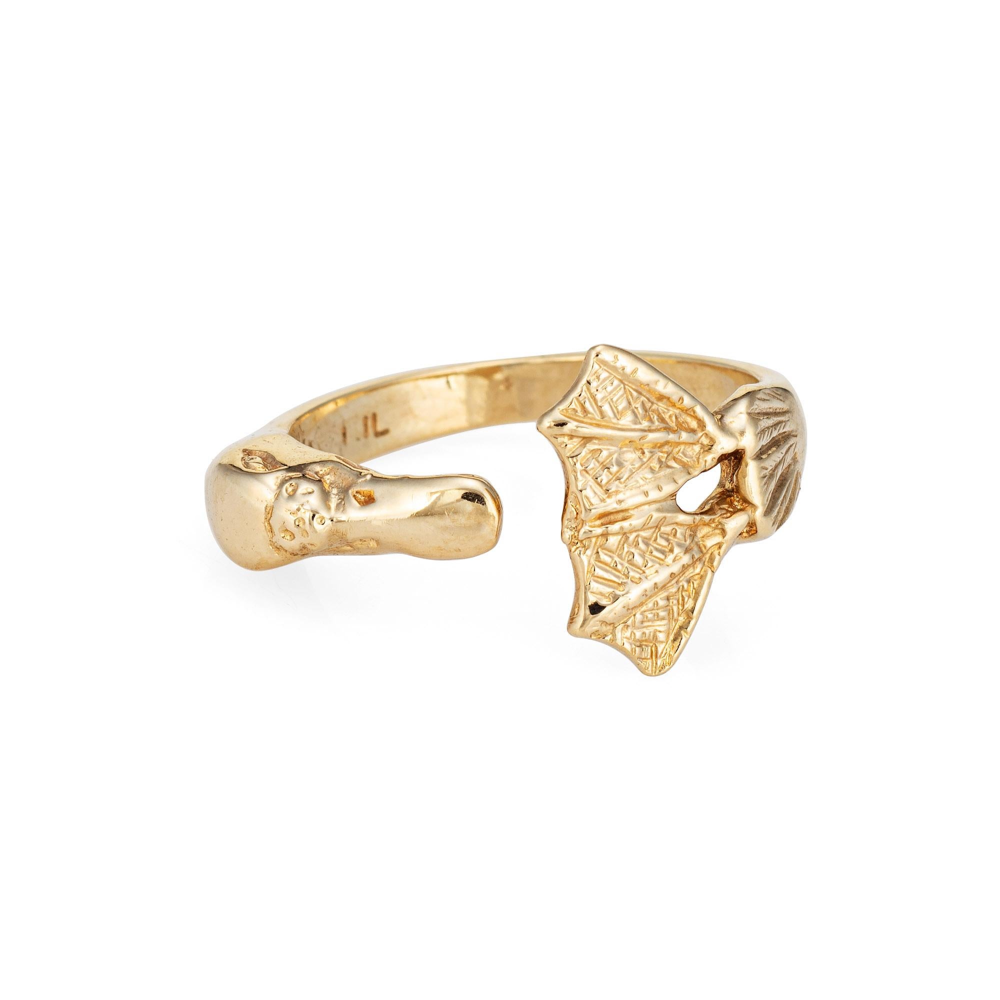 Distinct duck ring crafted in 14 karat yellow gold. 

The sweet as can be ring features a duck with webbed feet and bill to the center of the band. The band is great worn alone or layered with you fine jewelry from any era. The low rise band (2mm -