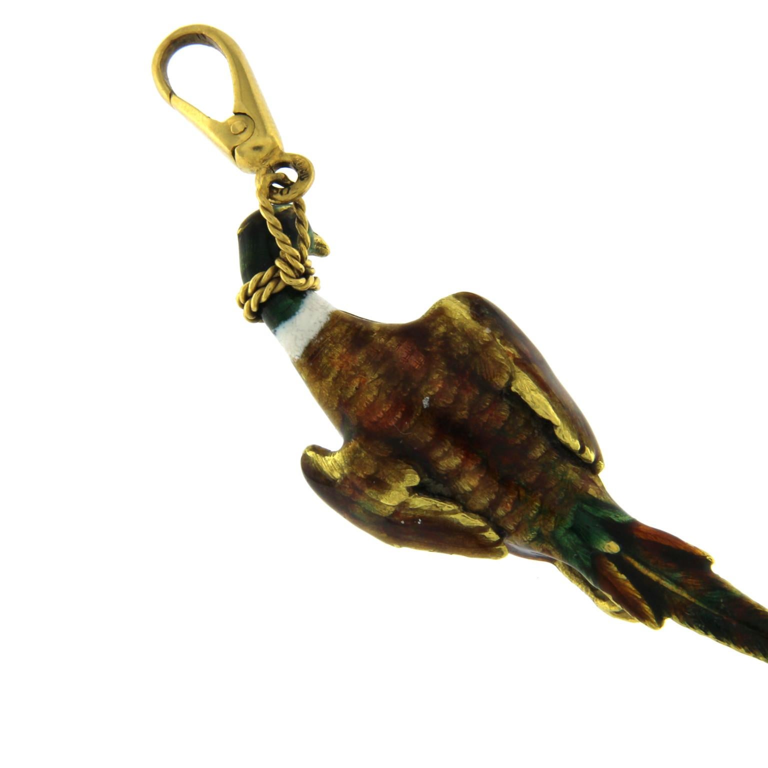 Duck/pheasant Charm 18k enameled with small carabiner hook
total weight of gold GR 20.80
Stamp 750