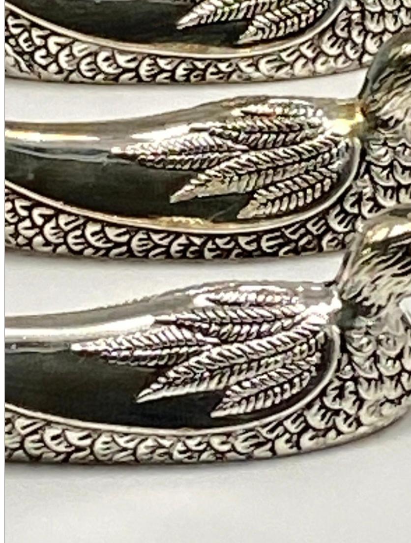 These are knife rests in silver plate metal. They are scupltures representing Ducks. 
They have been made in France in circa 1970.