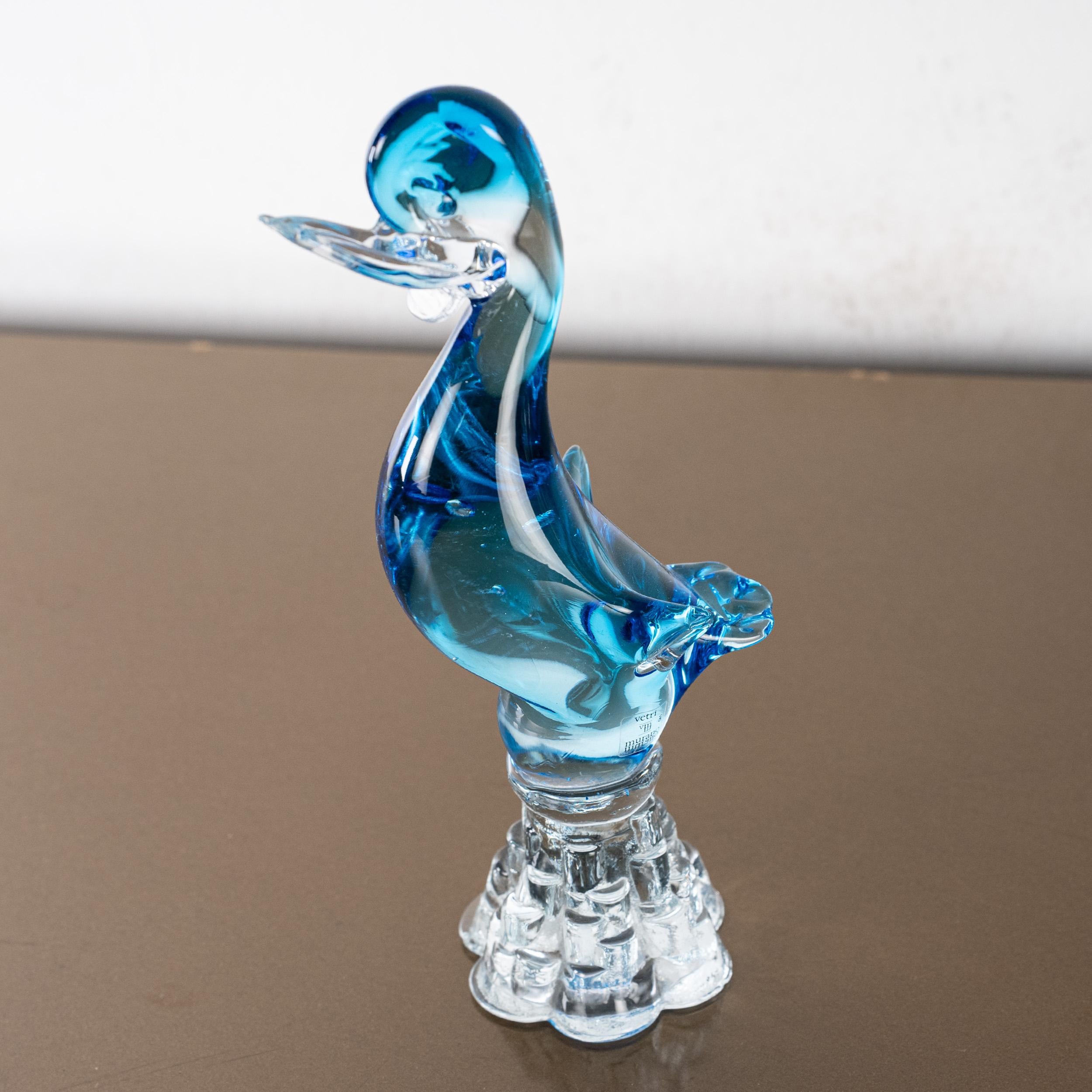 Duckling Sculpture in Blue Murano glass with crystal base, Italy in stock

Dimensions: L 11 cm x H 25 cm x D 11 cm ( L 4.3