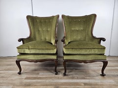 Two Louis XV style Bergère armchairs in walnut and green fabric from the 1950s