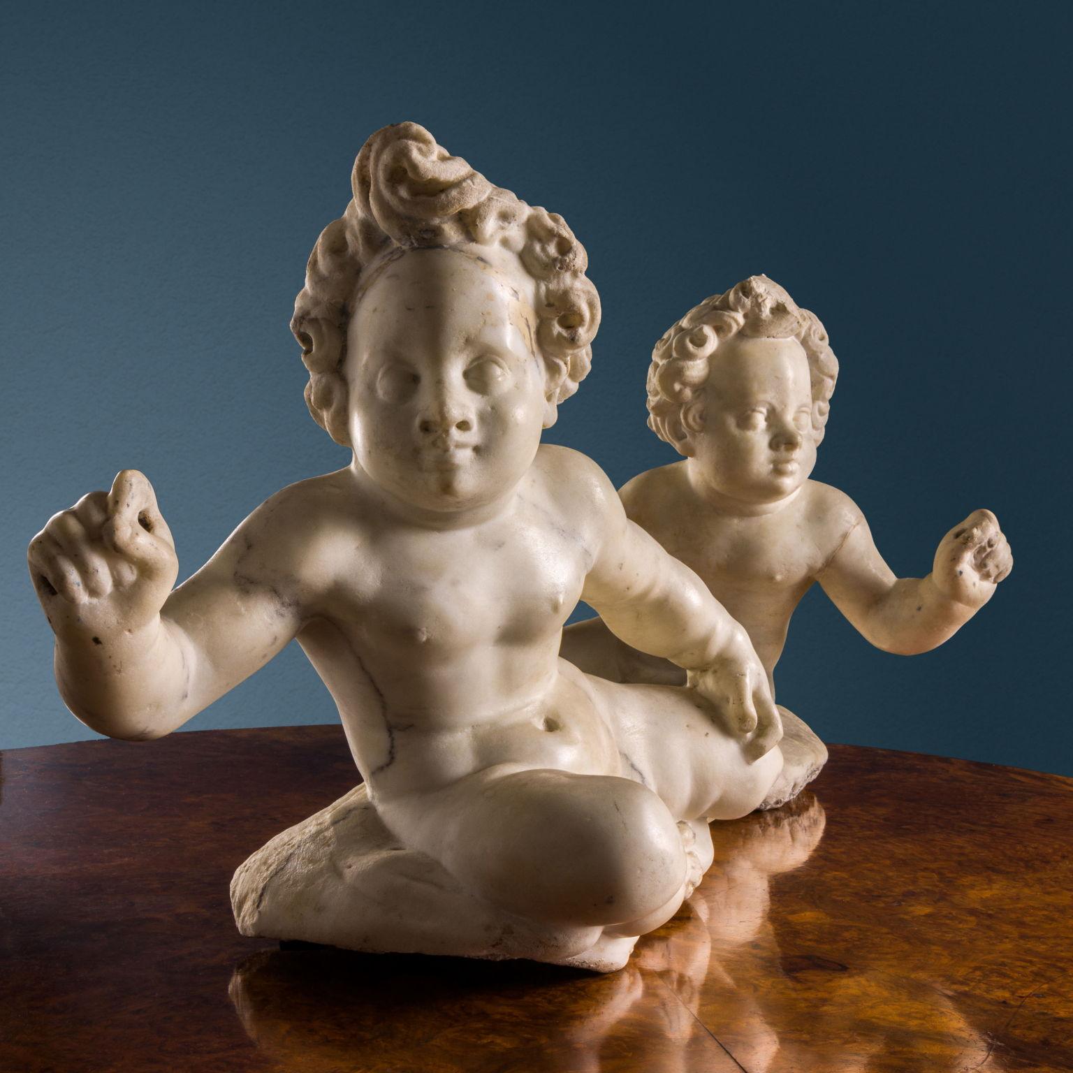 17th Century Two Putti, c. 1640-1650. Giovanni Pietro and Carlo Carra (workshop of) For Sale