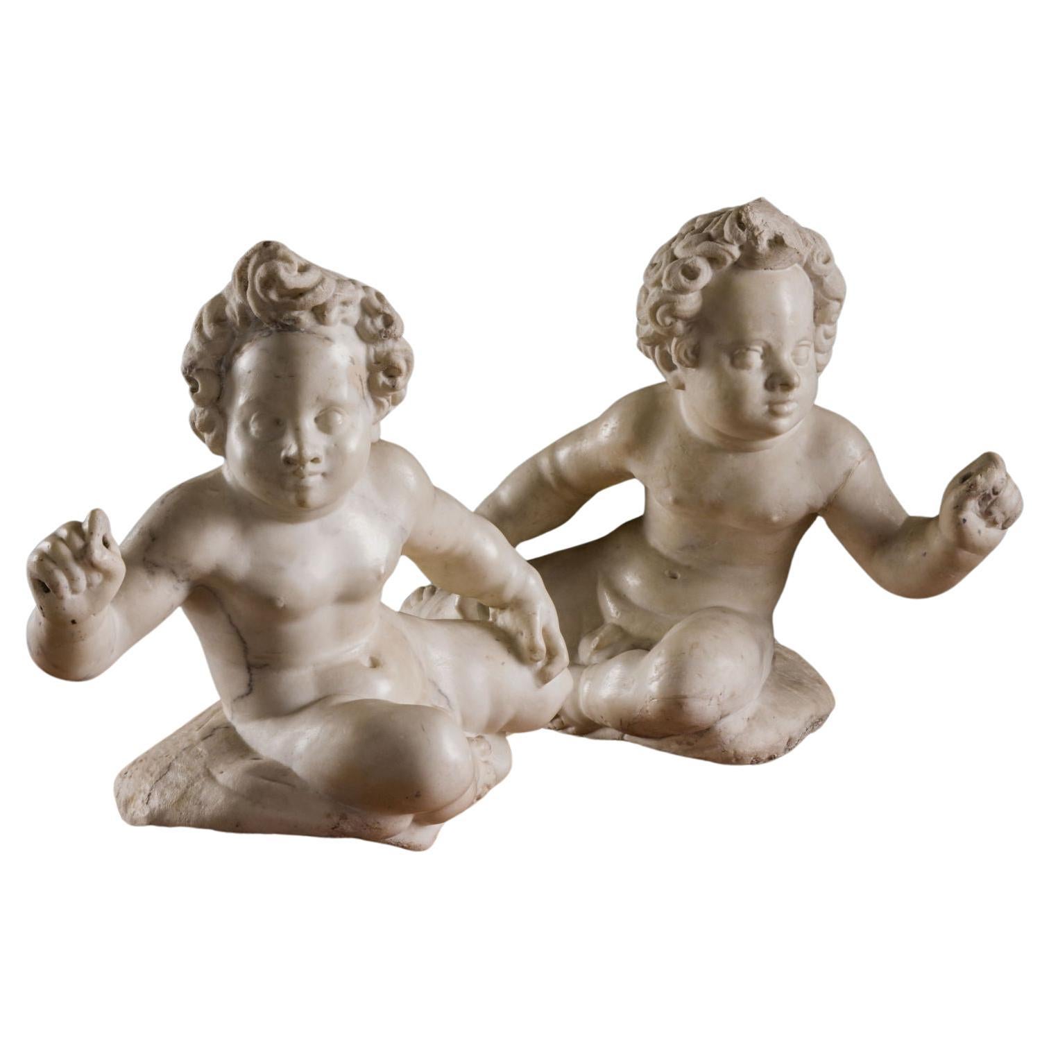 Two Putti, c. 1640-1650. Giovanni Pietro and Carlo Carra (workshop of) For Sale