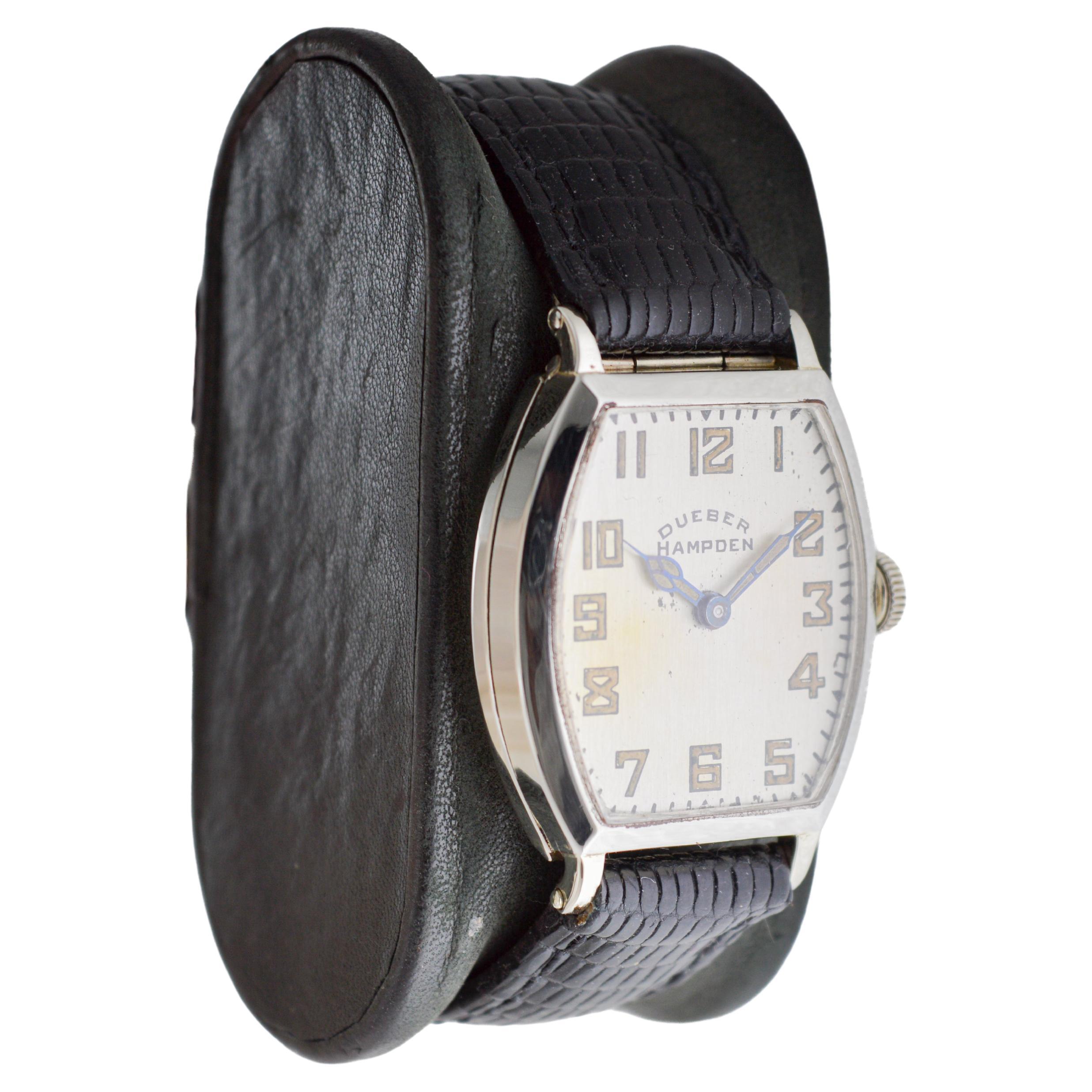 FACTORY / HOUSE: Dueber Hampden
STYLE / REFERENCE: Molly Stark / Tonneau Art Deco 
METAL / MATERIAL: White Gold Filled
CIRCA / YEAR: 1920 / 21
DIMENSIONS / SIZE: Length 29mm X Width 39mm
MOVEMENT / CALIBER: Manual Winding / 7 Jewels / Caliber 3 / 0