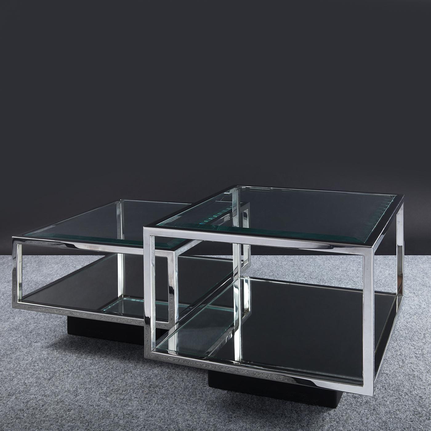 Designed by Nuova Benyacht, the stunning Duetto coffee tables are characterized by their elegant, squared lines. They harmoniously combine the clean linearity of stainless steel structures with the brightness of high quality glass. Nuova Benyacht is