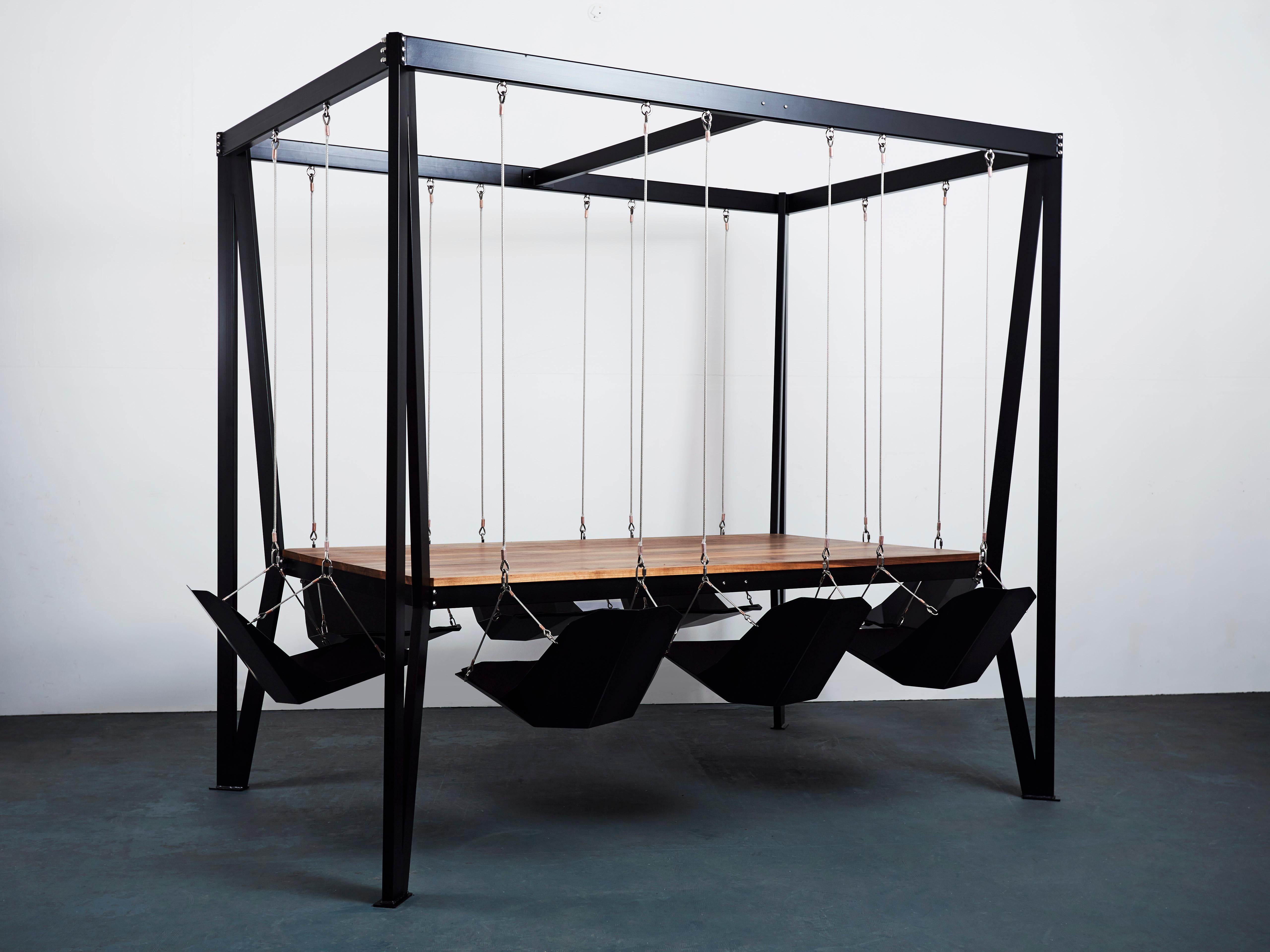 Bring the playground into the boardroom, dining room, or living space with the Original Swing Table by Duffy London. The Swing table seats up to 8 people and works equally well as a dining table or boardroom table.

Snap staff or dinner guests out