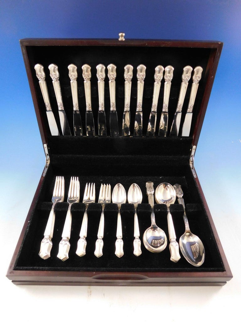 Duke of Windsor by Manchester c1937 sterling silver Flatware set - 62 pieces. This pattern has a Scandinavian influence Modern design. This set includes:

12 knives, 8 3/4