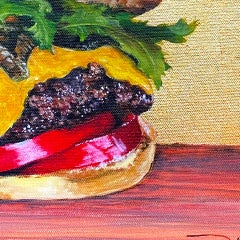 Natura morta impressionista, "Questo non è un cheeseburger".