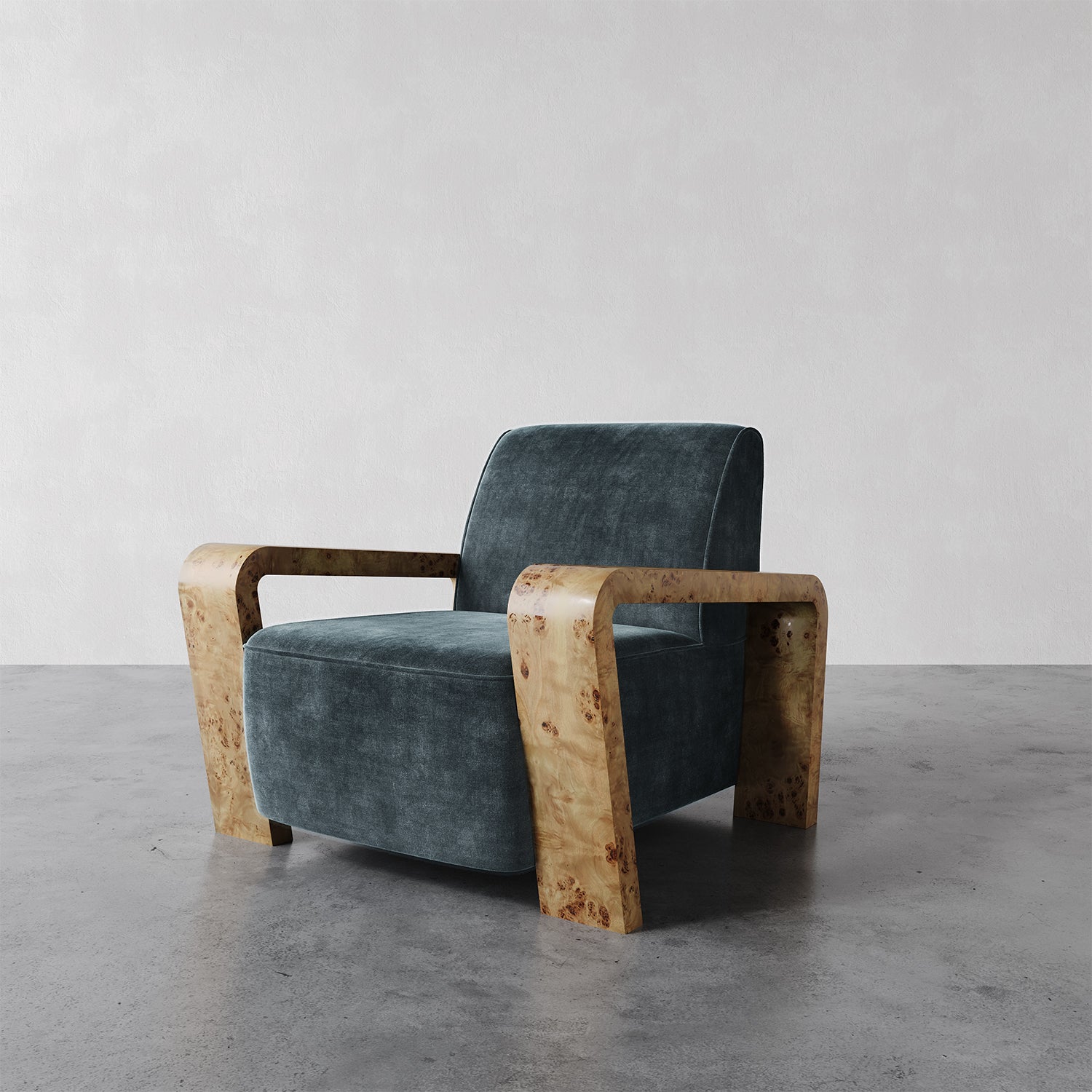 The Dumas Lounge Chair combines a clean, tightly tailored seat and back with wide Oak burl arms, creating a distinctive and inviting design. Its deep seat and curving legs pay homage to the Art Deco lounge chairs of the 1930s, mixing vintage