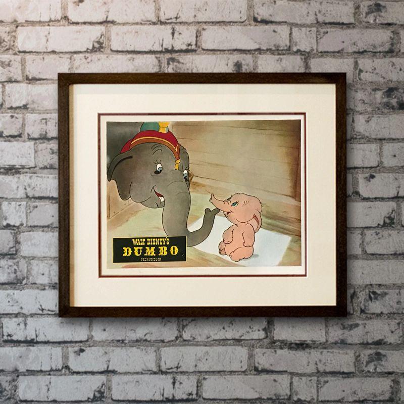 Dumbo, #1 Unframed Poster, 1950'S RR

Front-of-House Card (8 x 10 inches). Original Front-of-House Card for Dumbo.

This is #1 of a set of 8.

Year: 1950's Re-release
Nationality: United Kingdom
Type: Front-of-House Card
Size: 8 x