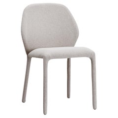 Fauteuil tapissé Dumbo beige de Zaven