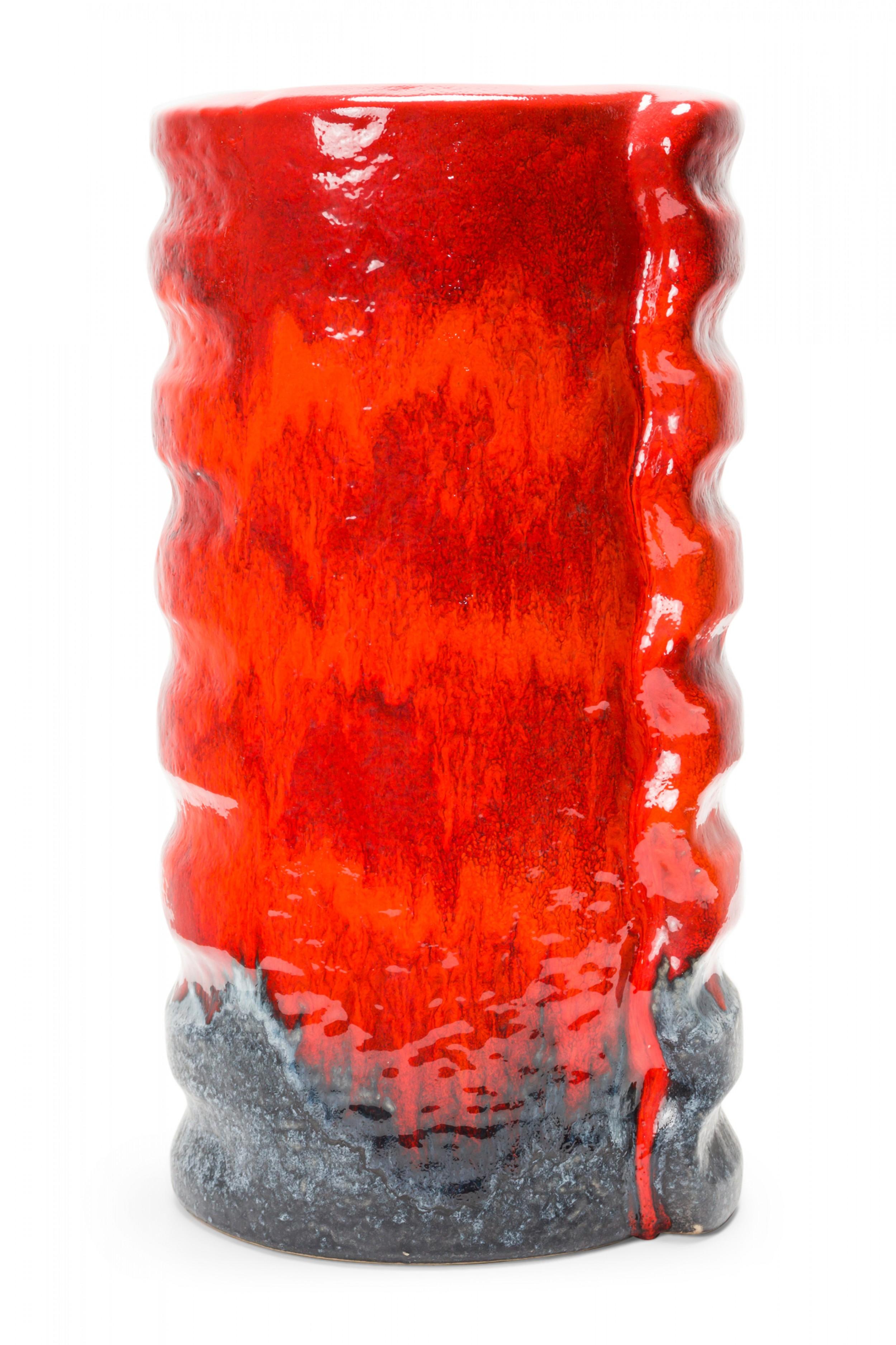 West German mid-century abstract ribbed form ceramic vase with an alternating red and orange fat lava glaze with a mottled gray glazed vase. (mark on bottom for Dümler & Breiden, RELIEF 24/39 GERMANY).