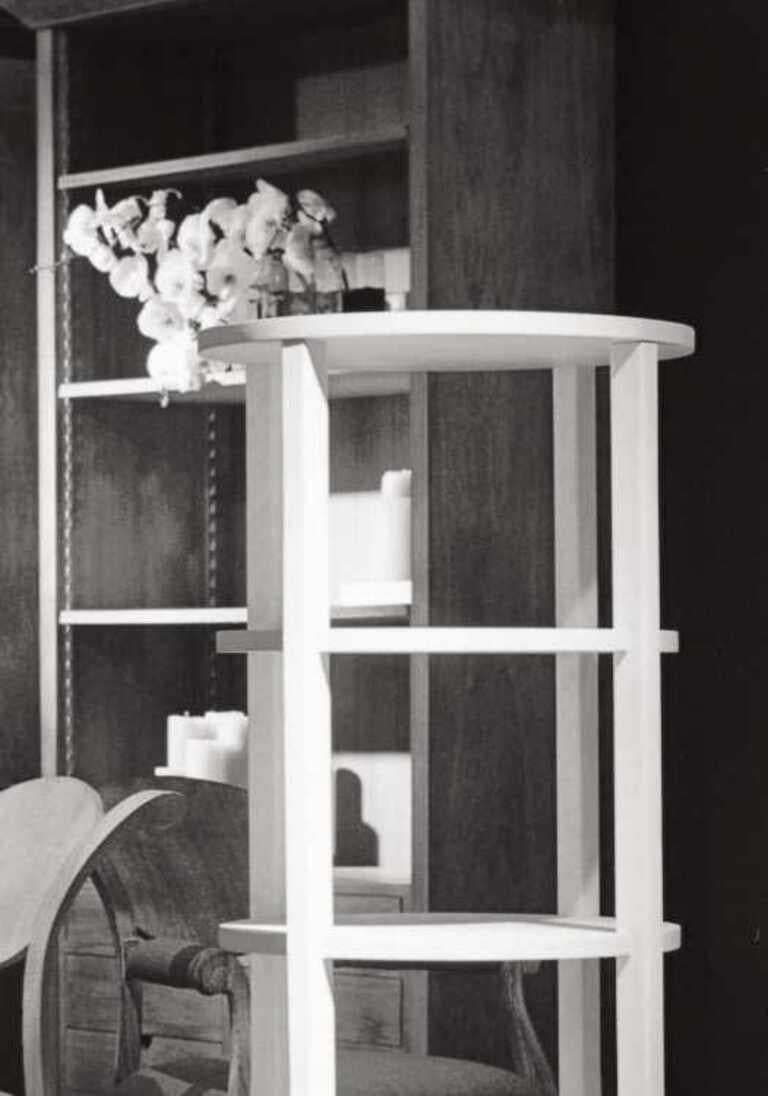 The Dummy Senior Tall Table is a statement piece that transcends the ordinary, bringing waves of sophistication to your space. This tall table not only stands out for its height but also for its captivating design, featuring shelves adorned with a