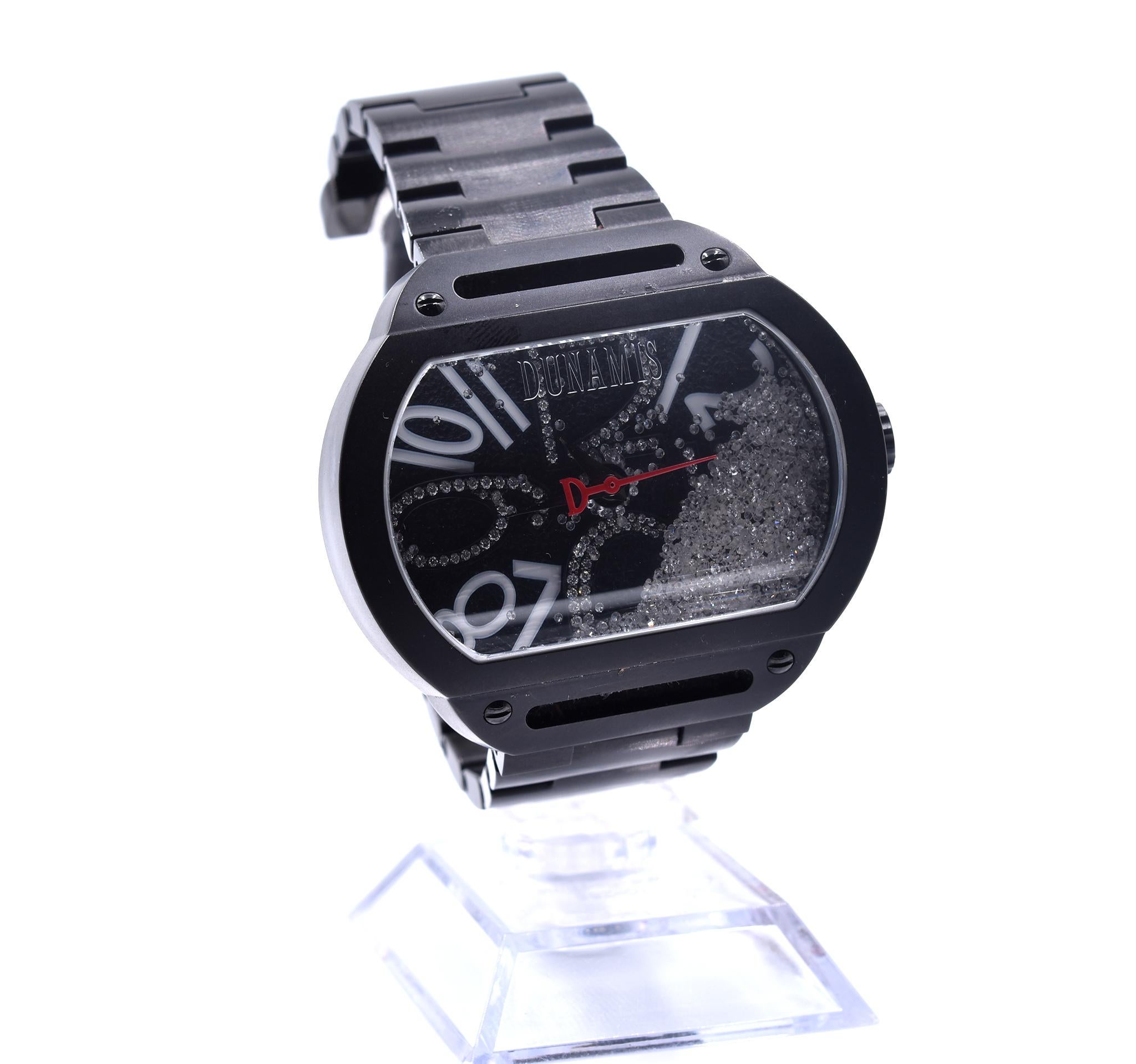 Movement: automatic swiss movement
Function: hours, minutes, seconds
Case: 45mm x 50mm black stainless-steel case, sapphire protective crystal, screw-down crown, water resistant to 5 ATM
Dial: liquid diamond dial with black and red hands, diamond