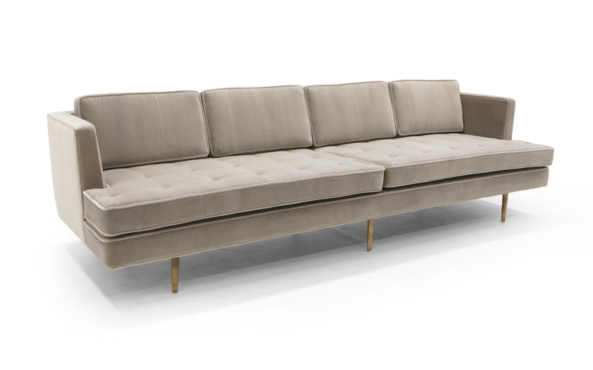 Stunning Edward Wormley for Dunbar sofa. Nine feet Long with Solid Brass Legs (These legs can be polished to a beautiful luster if you prefer). The sofa has been expertly restored and reupholstered in Lee Jofa Marlow Mohair, Pearl, with a retail
