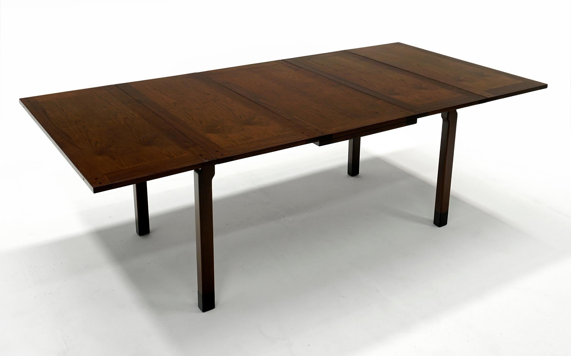 Mid-Century Modern Dunbar Extension Dining Table. Walnut with Two 15 Inch Stored Leaves, SEE VIDEO! For Sale