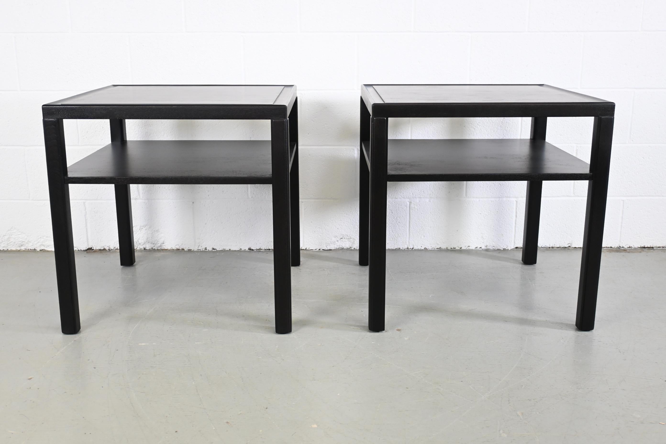 Dunbar Furniture Ebonized Mid-Century Modern two Tiered end tables, a pair

Dunbar Furniture, USA, 1960s

25 Wide x 25 Deep x 25.25 High.

Mid-Century Modern mahogany ebonized two-tiered side or end tables.

Professionally refinished.