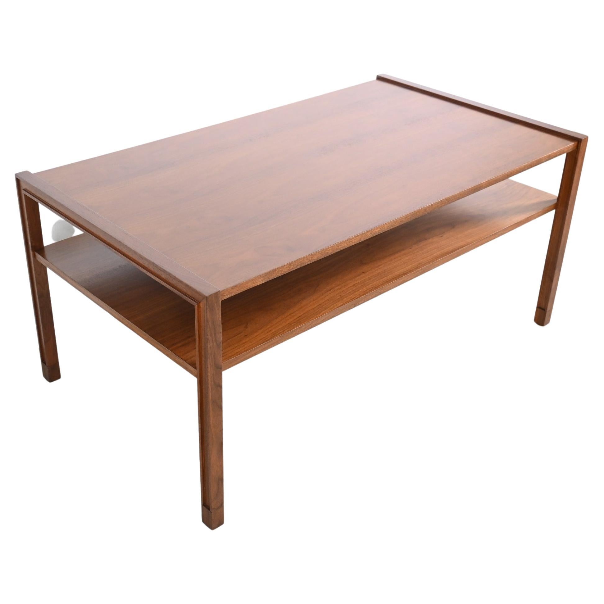 Dunbar Furniture Mid-Century Modern two tiered walnut coffee table

Dunbar Furniture, USA, 1950s, Unmarked

Measures: 48 Wide x 27 Deep x 22.25 High

Mid-Century Modern walnut coffee or cocktail table with shelf.

Professionally refinished.