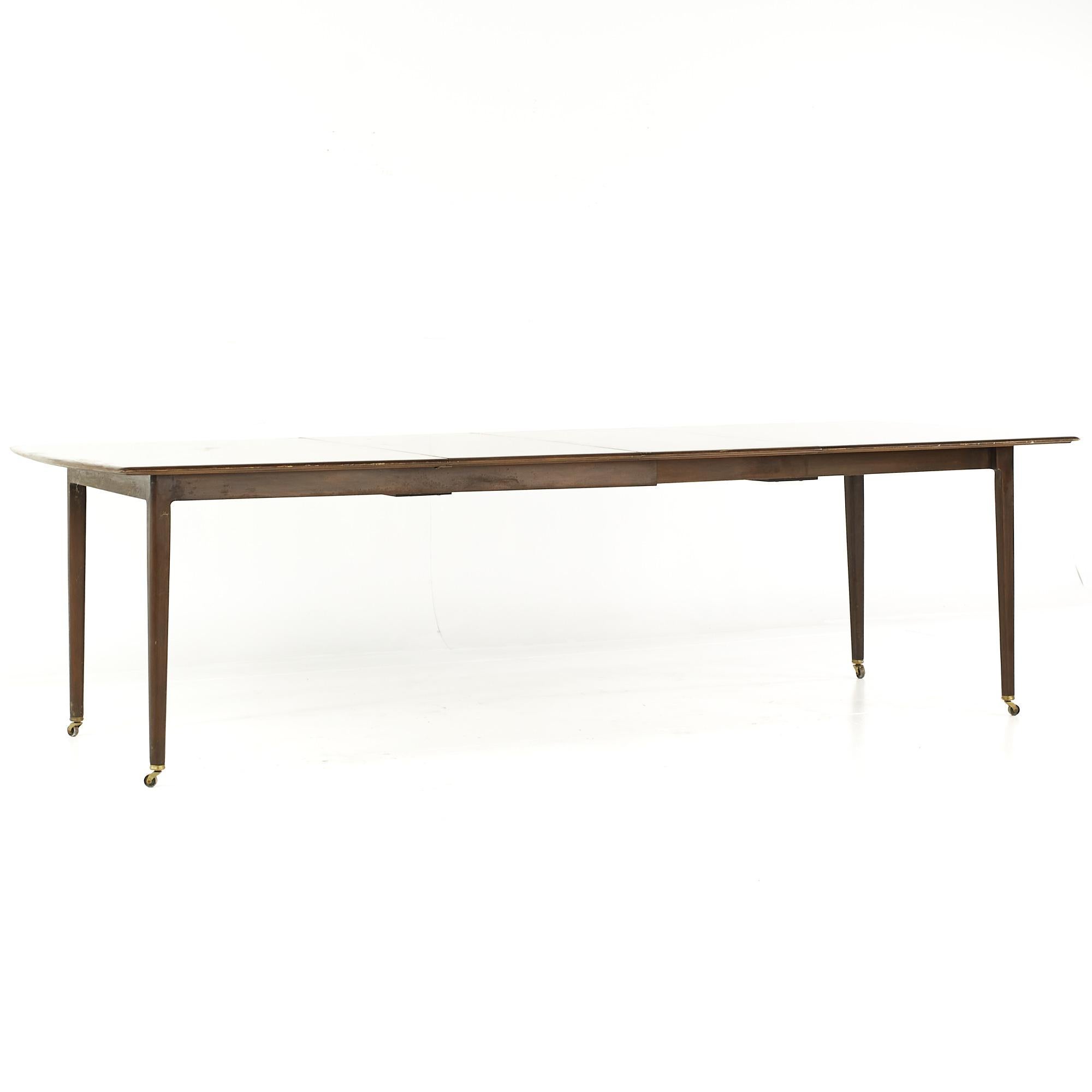 Dunbar Mid Century Expanding Hidden Leaf Walnut Dining Table with 2 Leaves For Sale 3