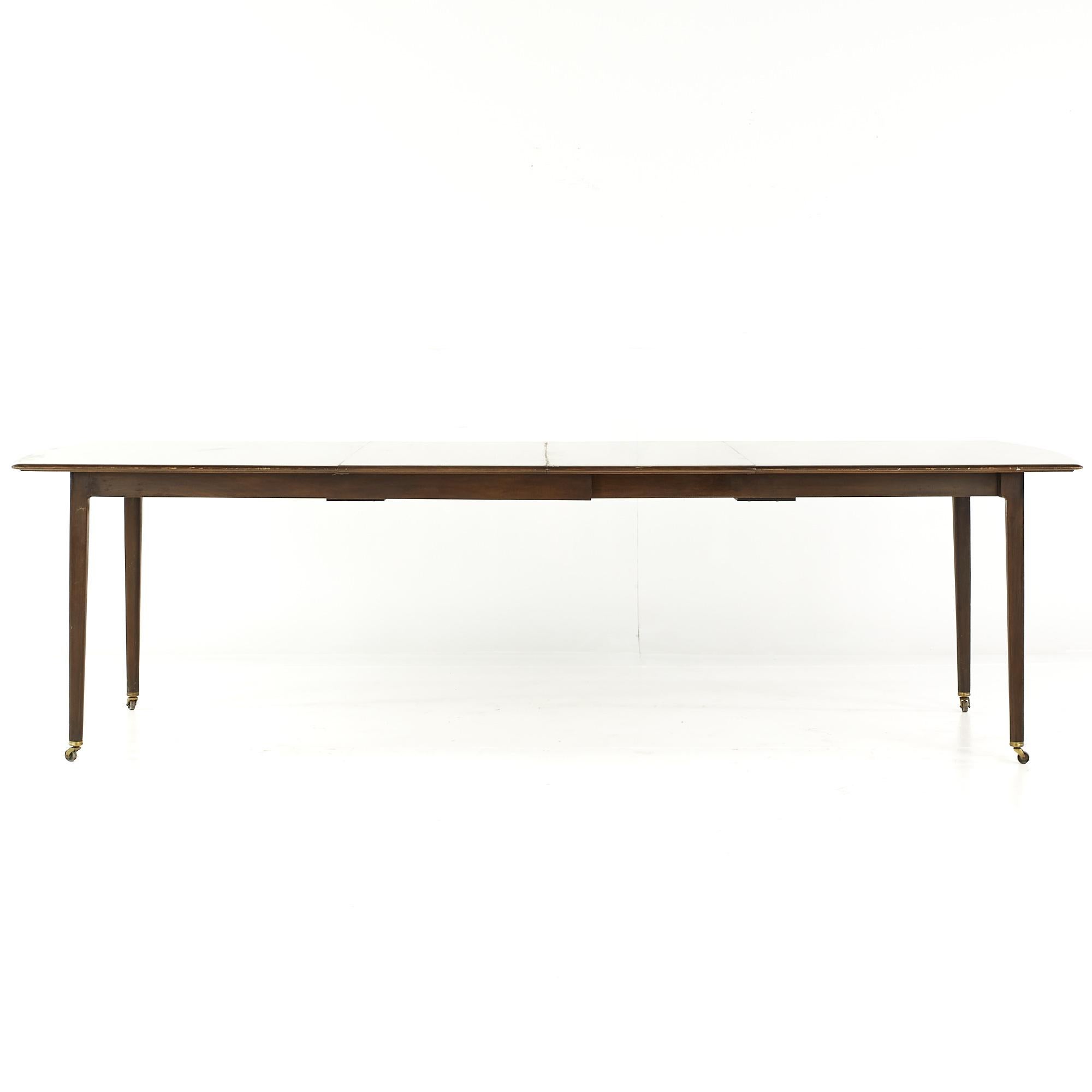 Dunbar Mid Century Expanding Hidden Leaf Walnut Dining Table with 2 Leaves For Sale 4